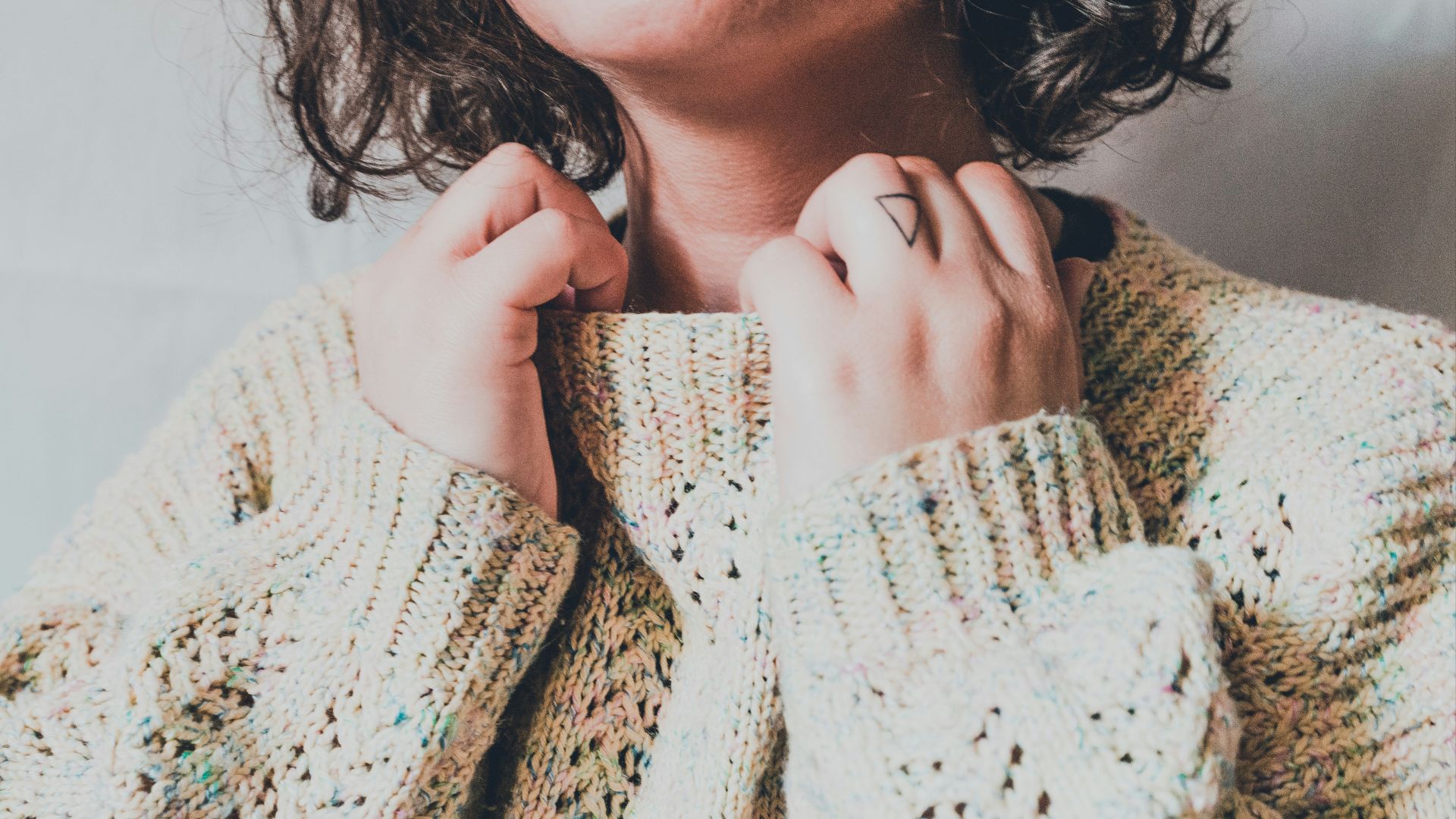 woman in white knit sweater