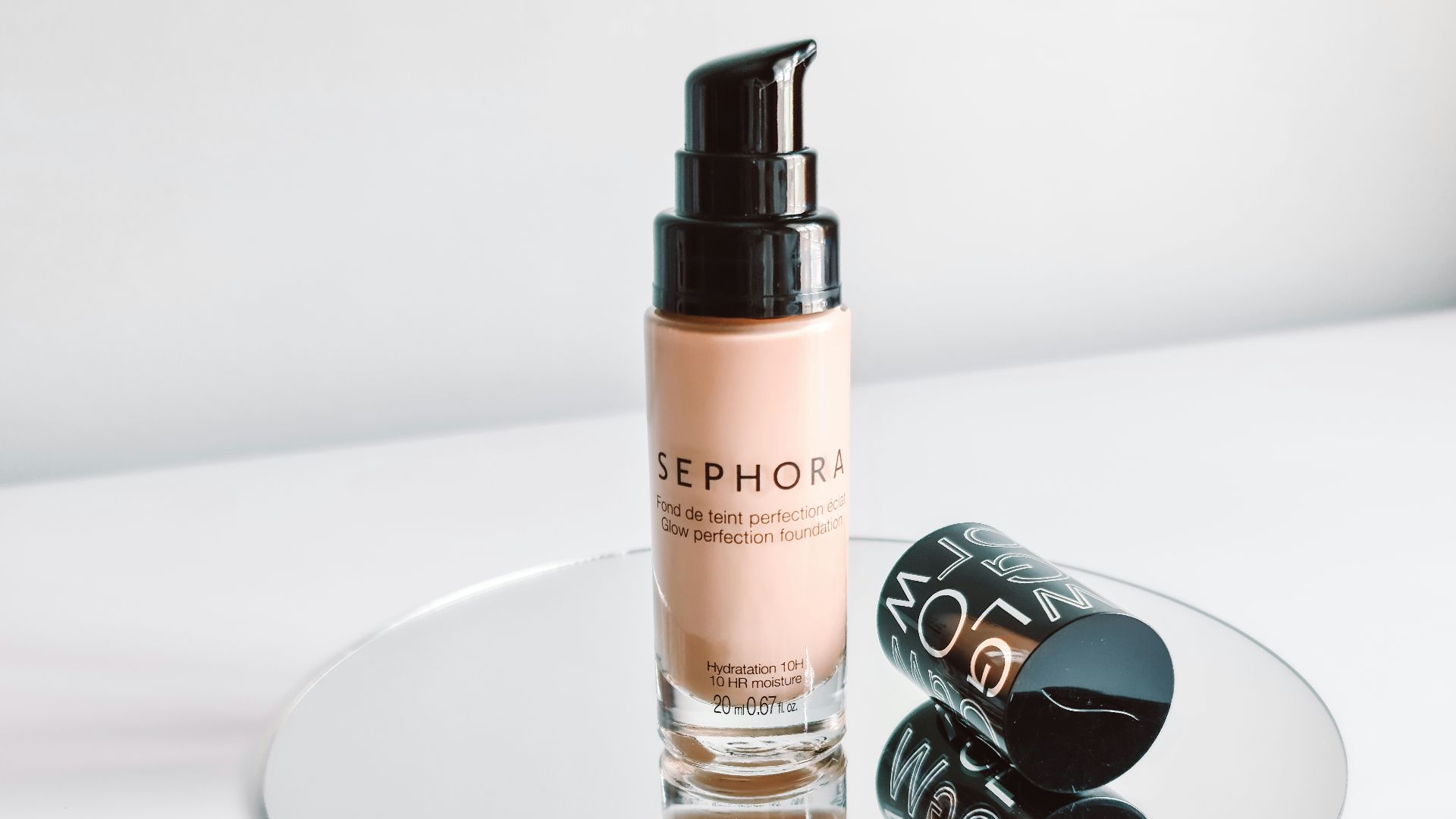 white and black spray bottle