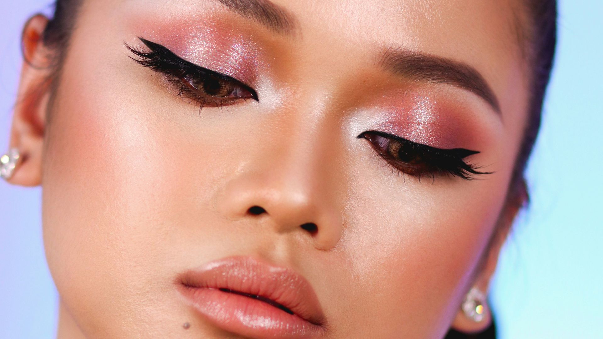 woman with pink lipstick and white shirt