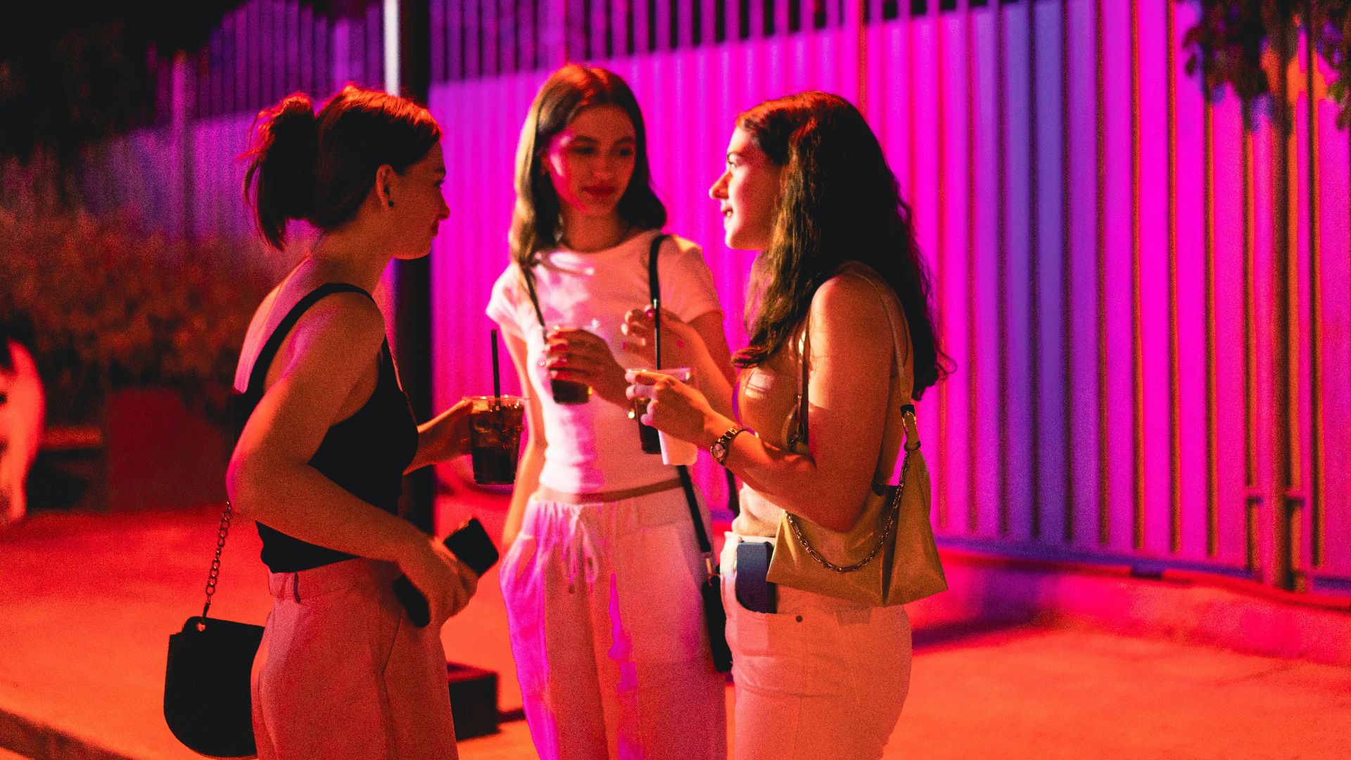 a group of women standing on a stage