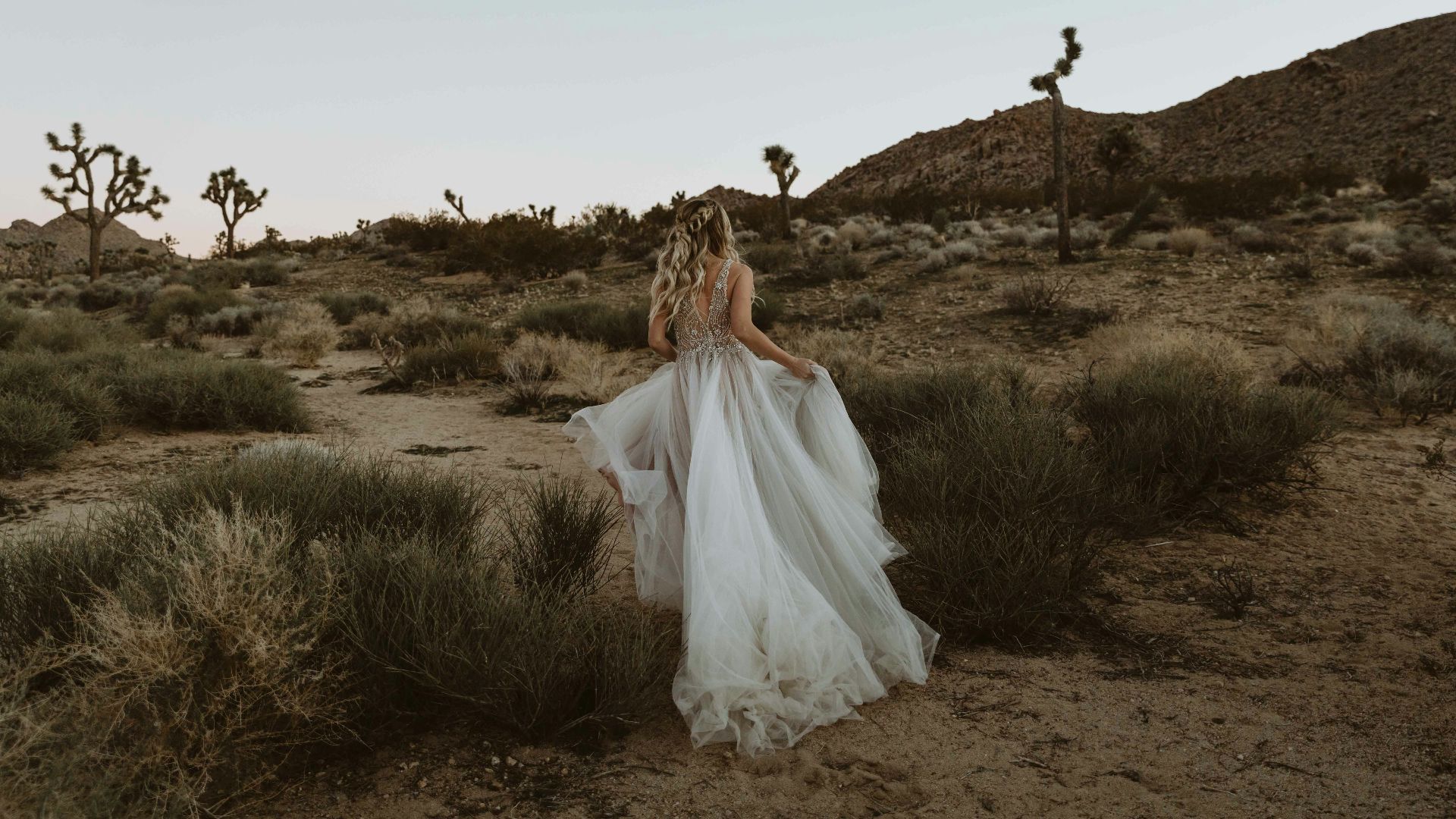 bride running at the desert