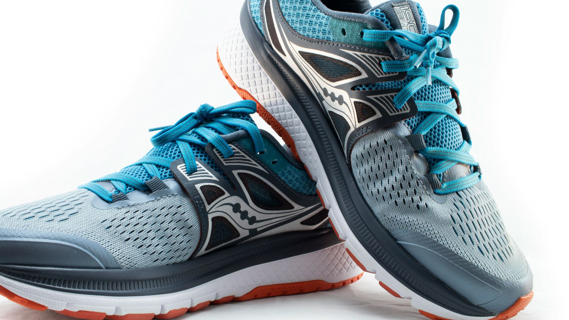 a pair of running shoes on a white background