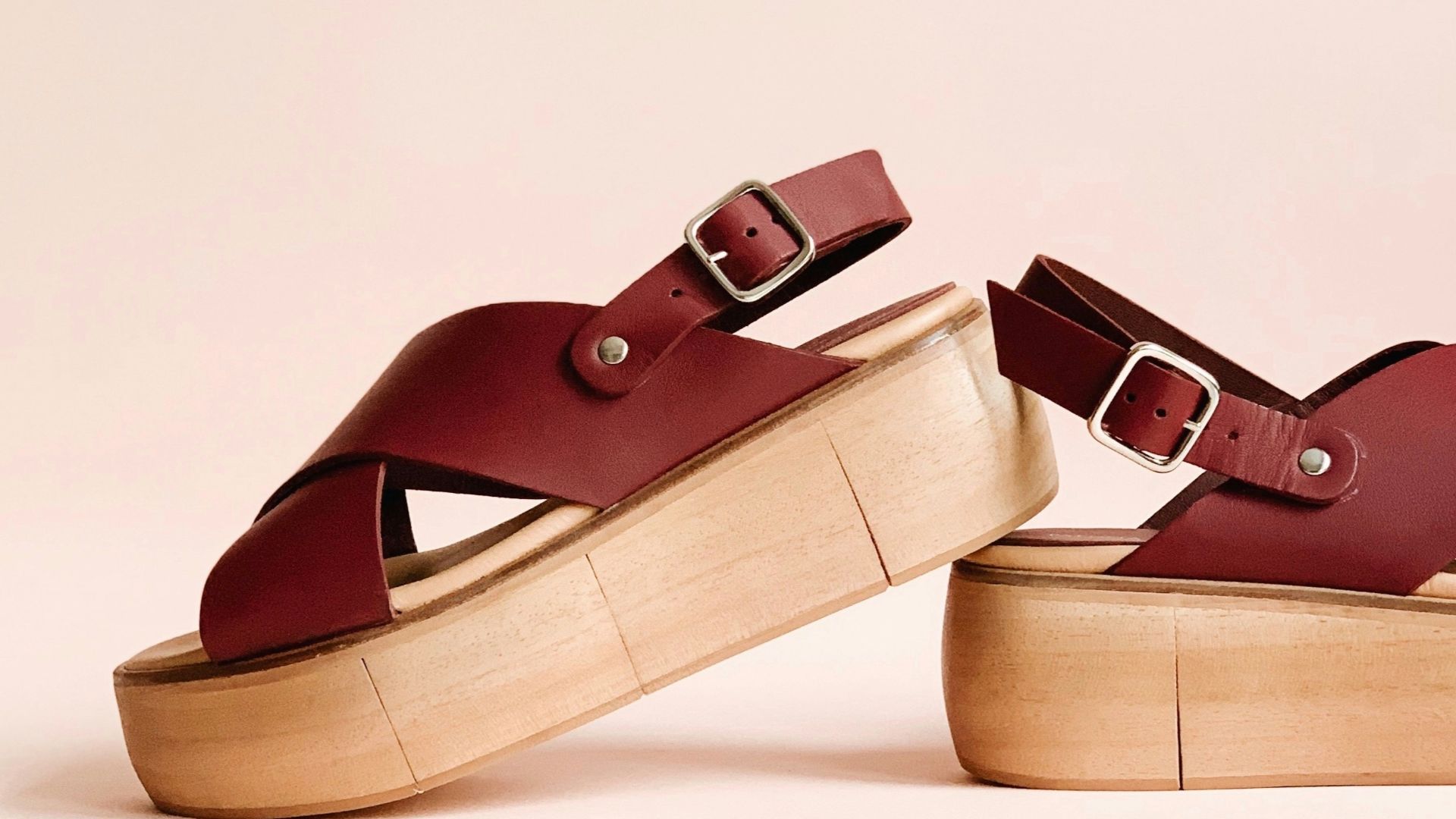 pair of maroon wedges