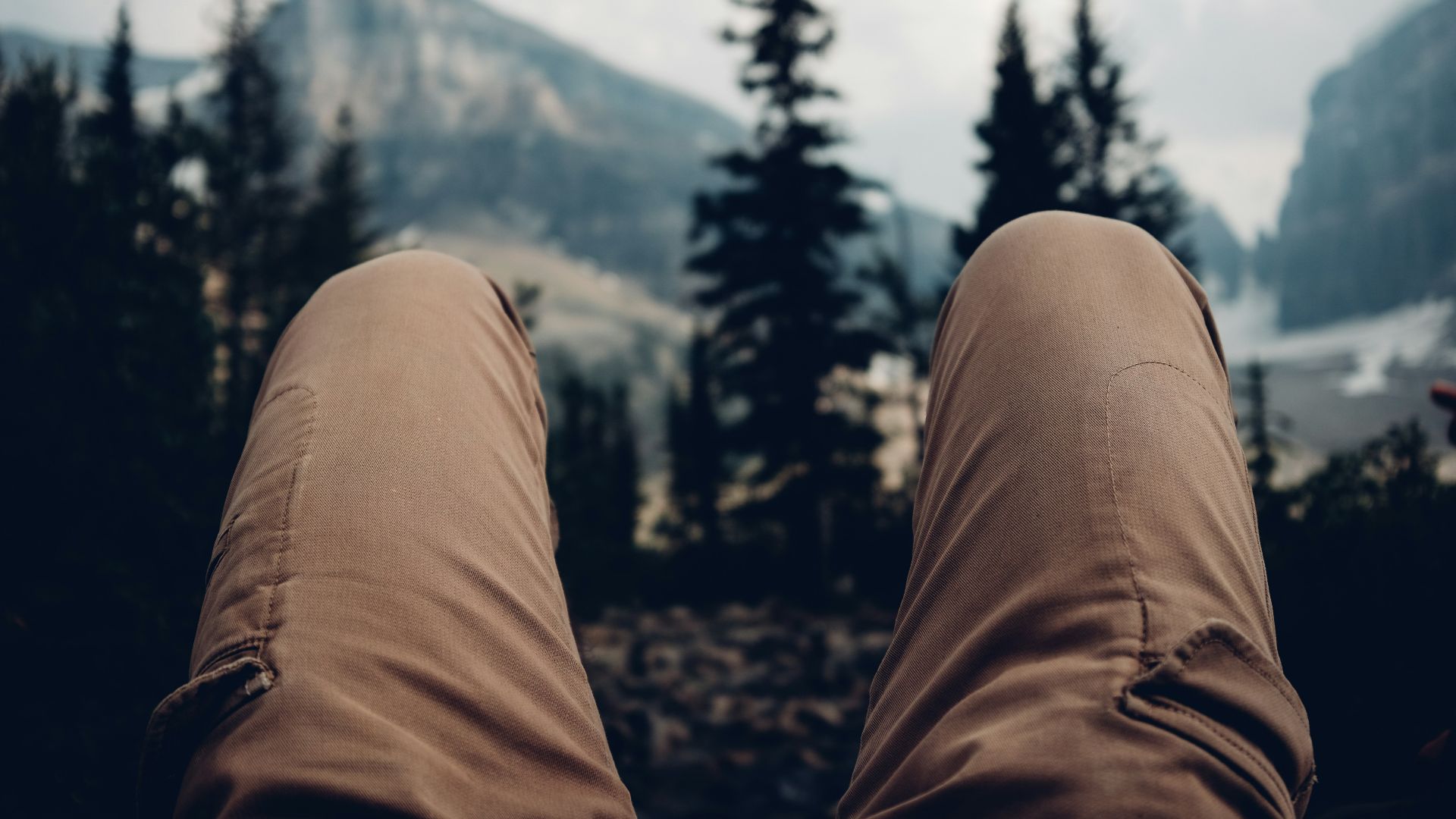 selective focus photography of person wearing brown cargo pants