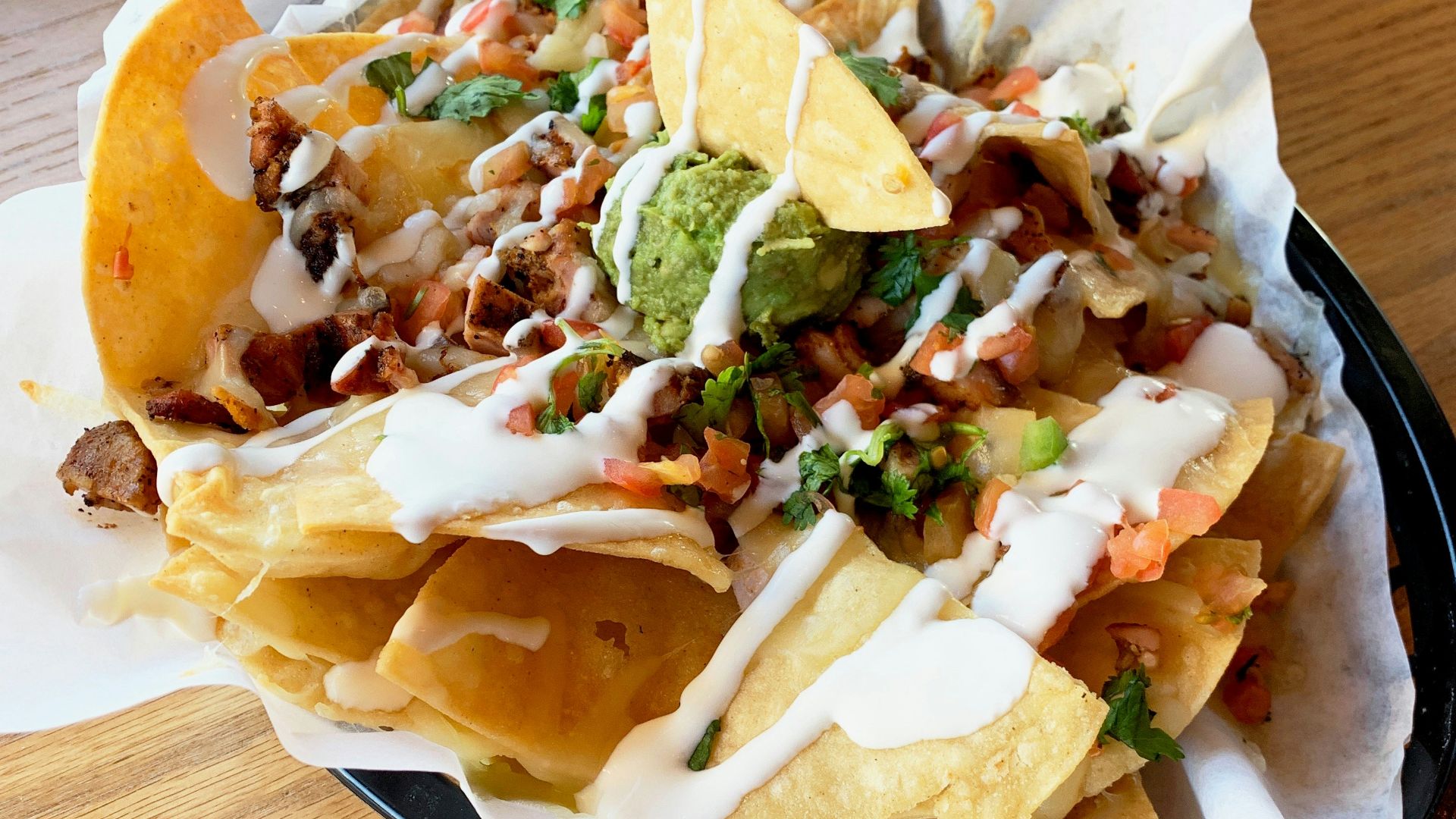 nachos on oval tray