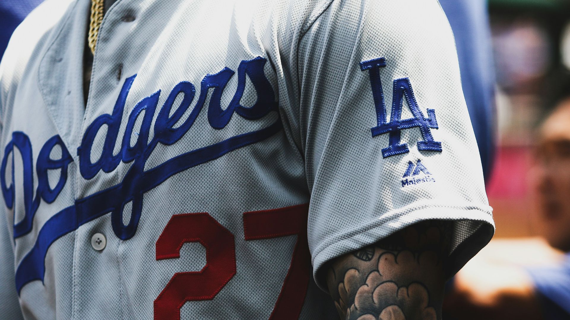 man in white and black jersey shirt
