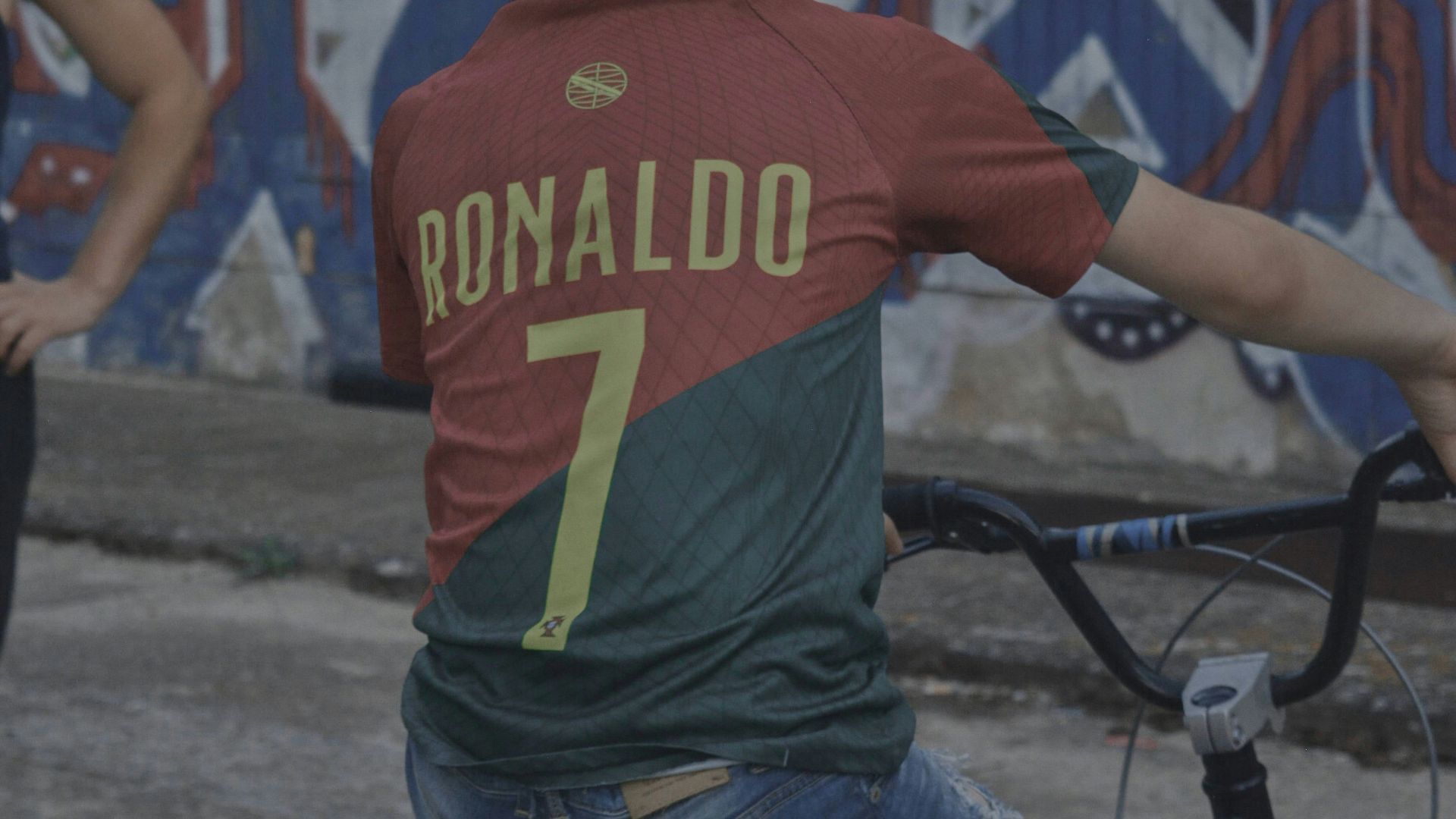 A couple of people that are on a bike