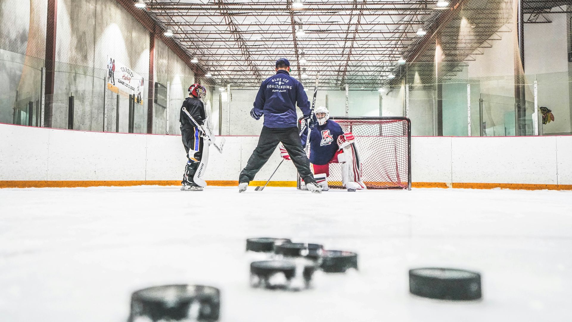 men playing ice hockey