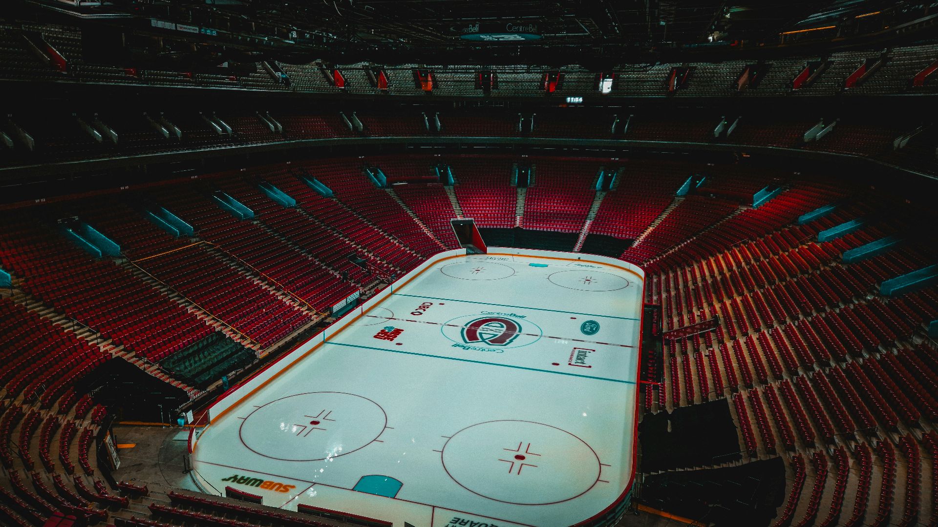an overhead view of a hockey rink in a stadium