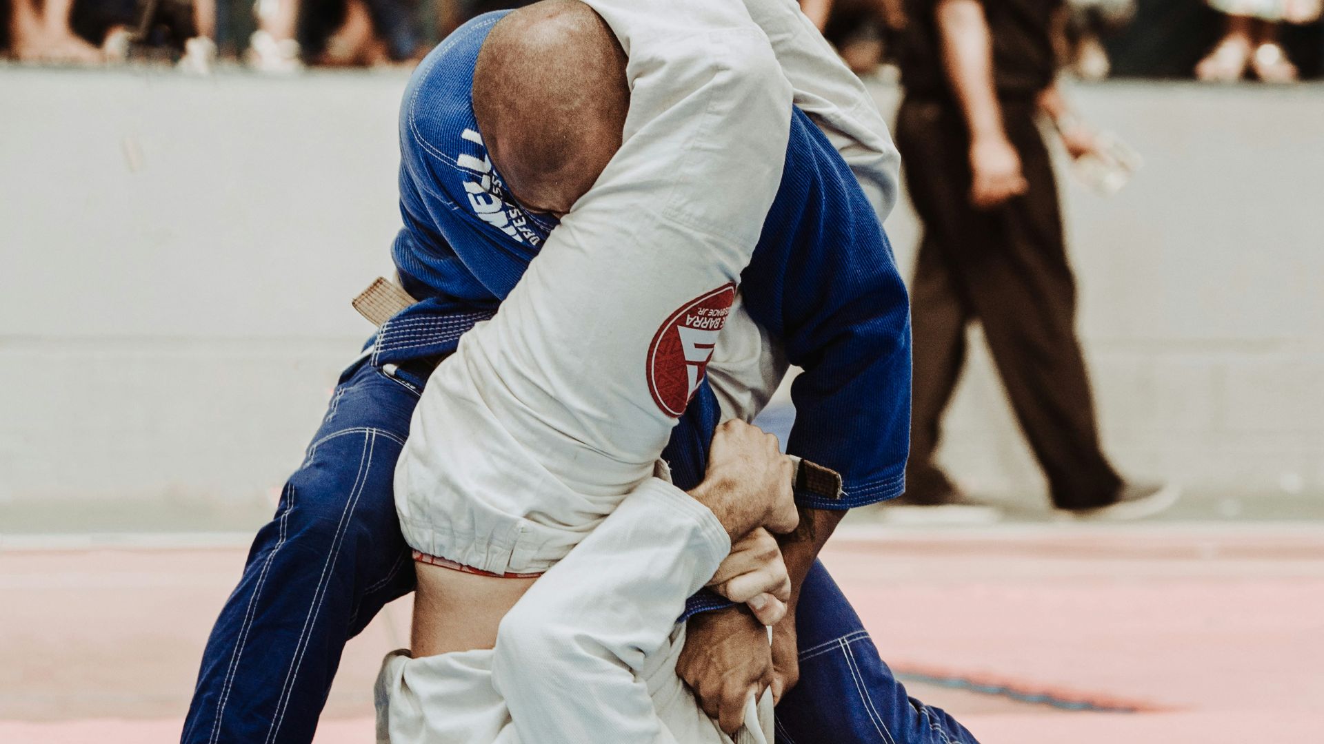 shallow focus photo of two man playing taekwondo