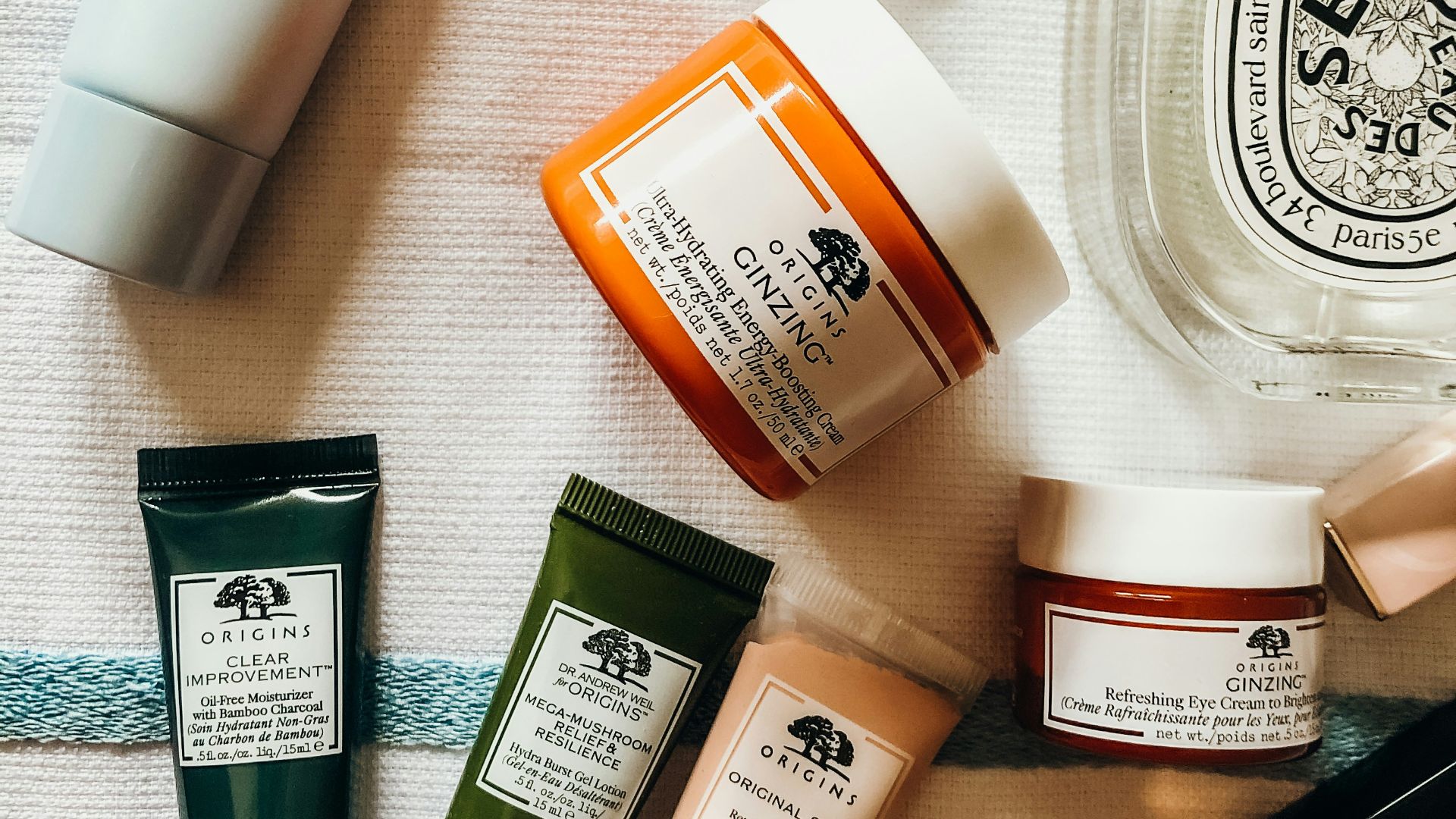 white and orange plastic bottle