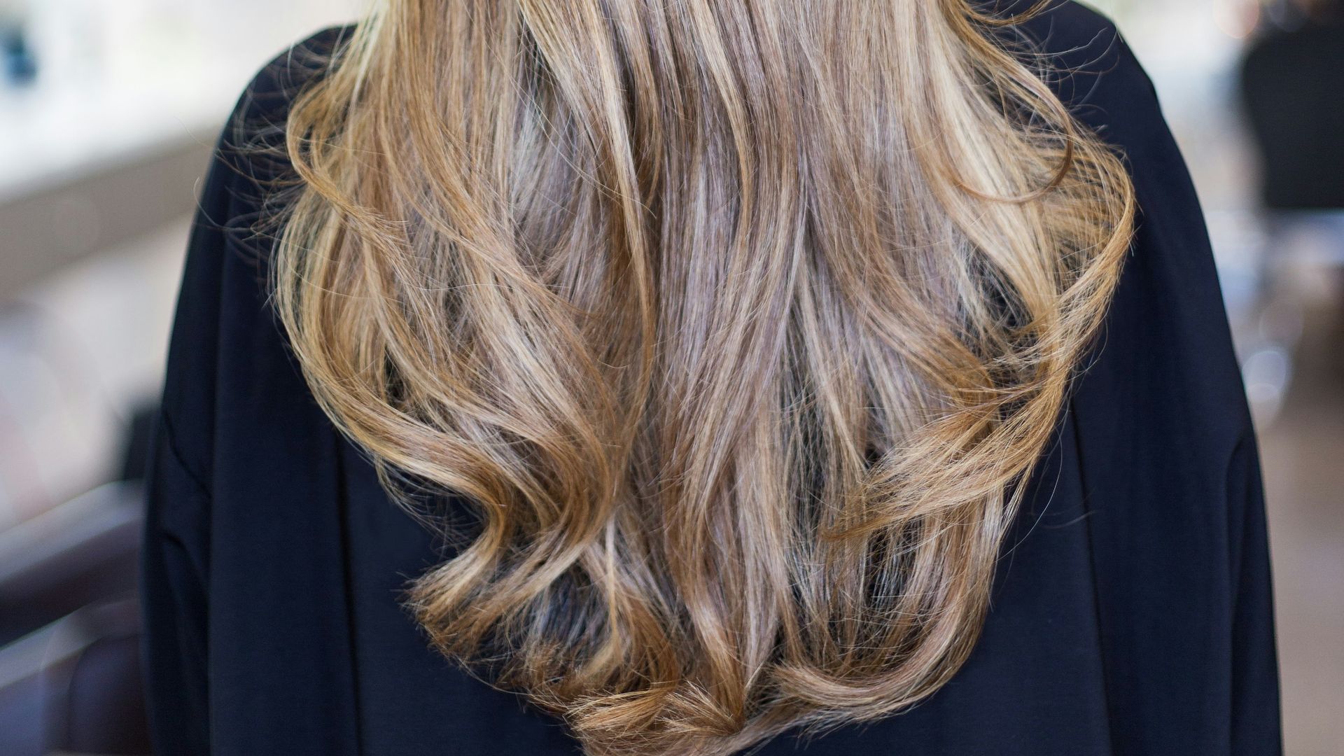 person wearing black top