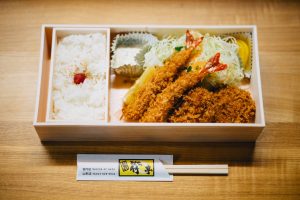 ebi-tempura-bento-on-brown-wooden-table-884596-300x200.jpg