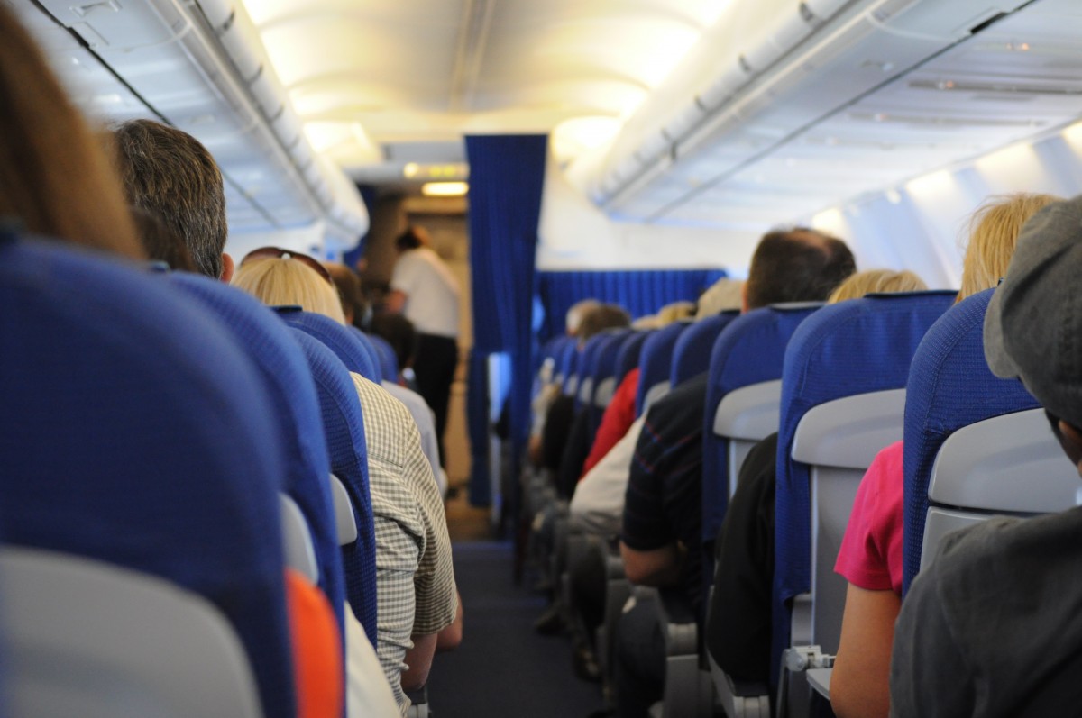airplane_on_board_seats_people_travel_transportation_aisle-745740-1551230232762.jpg