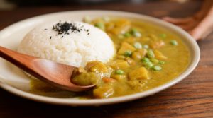 cooked-rice-and-curry-food-served-on-white-plate-674574-300x167.jpg