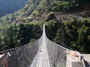 Crossing_the_Suspension_Bridge_below_Ghasa_Nepal-300x225.jpg