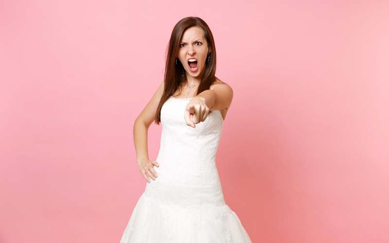 16-angry-bride-woman-in-white-wedding-dress-swearing-screaming-pointing-index-finger.jpg