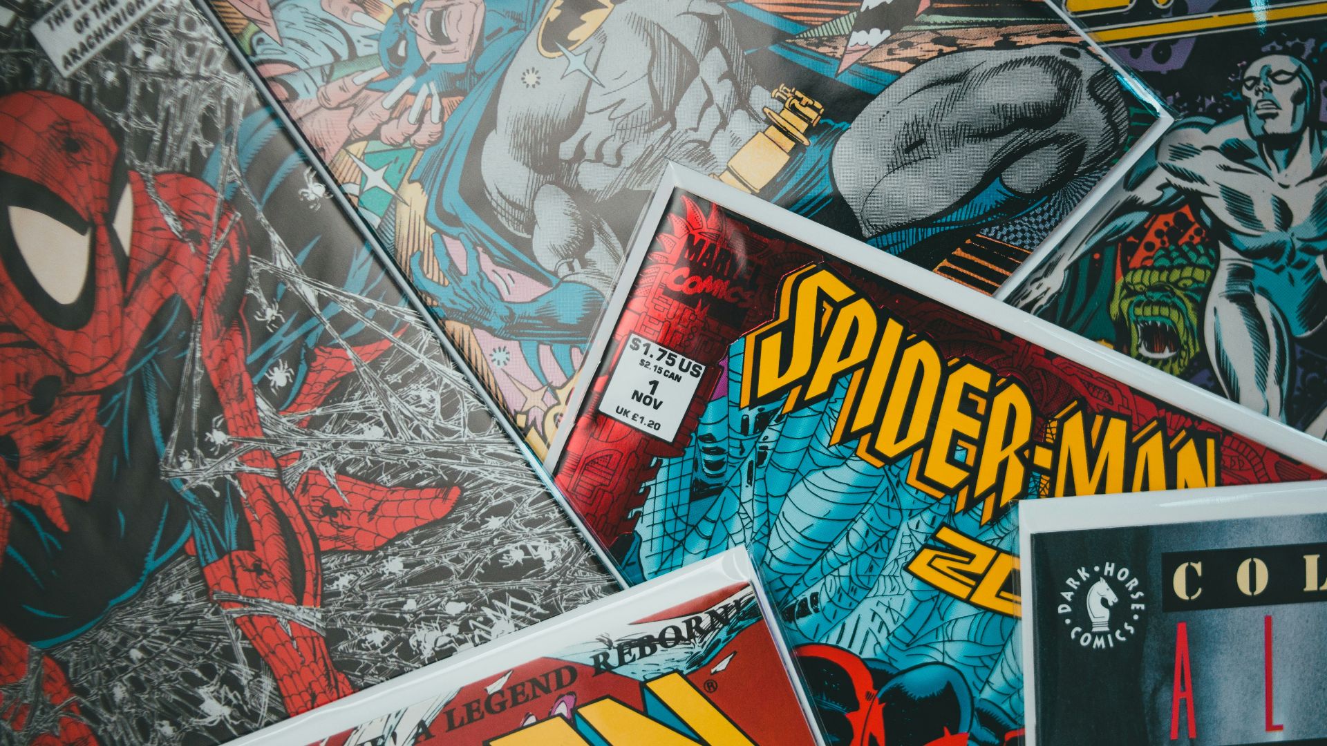 a pile of comics sitting next to each other