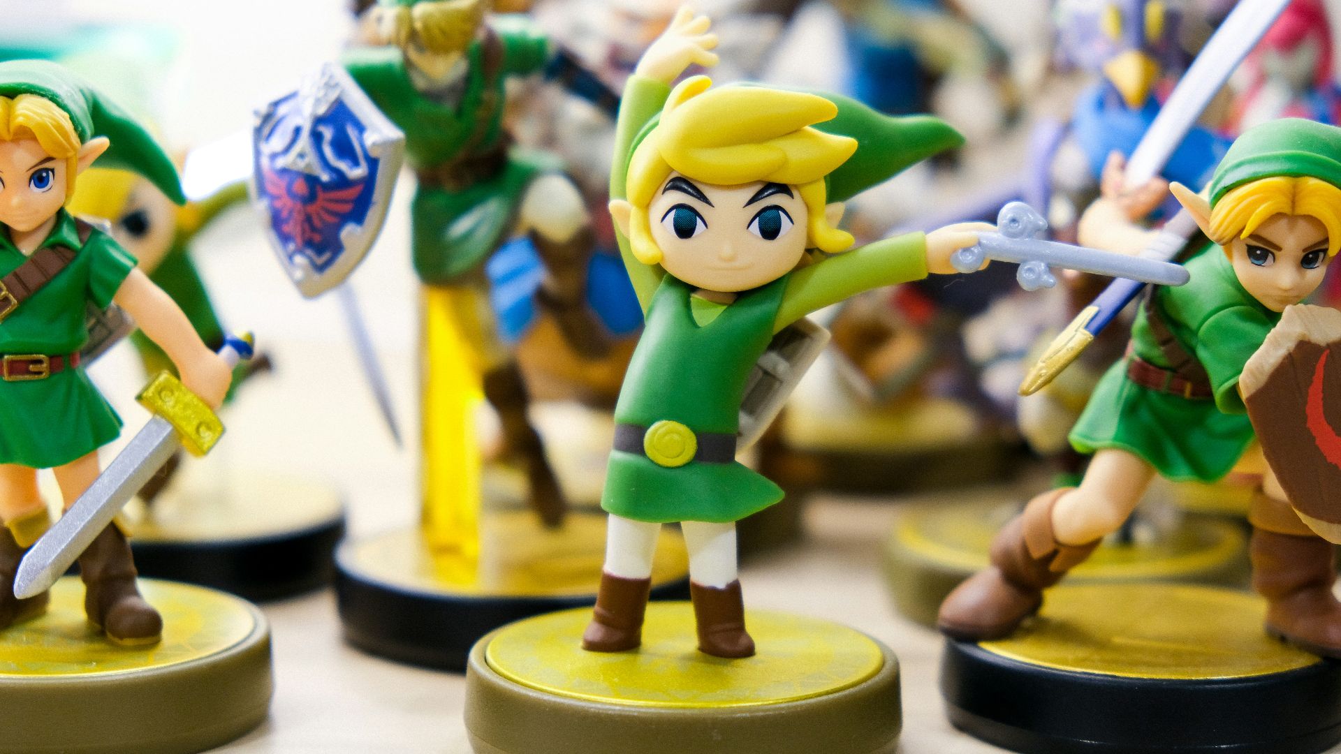 selective focus photography of Link vinyl figures