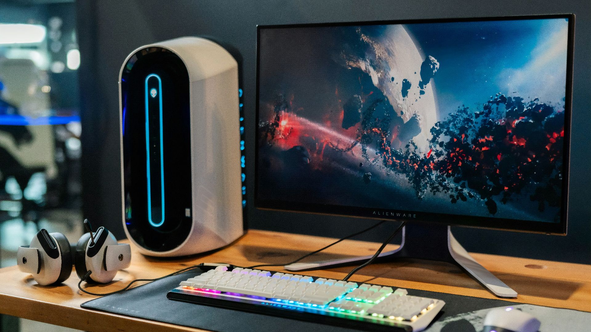 black flat screen computer monitor beside white computer keyboard