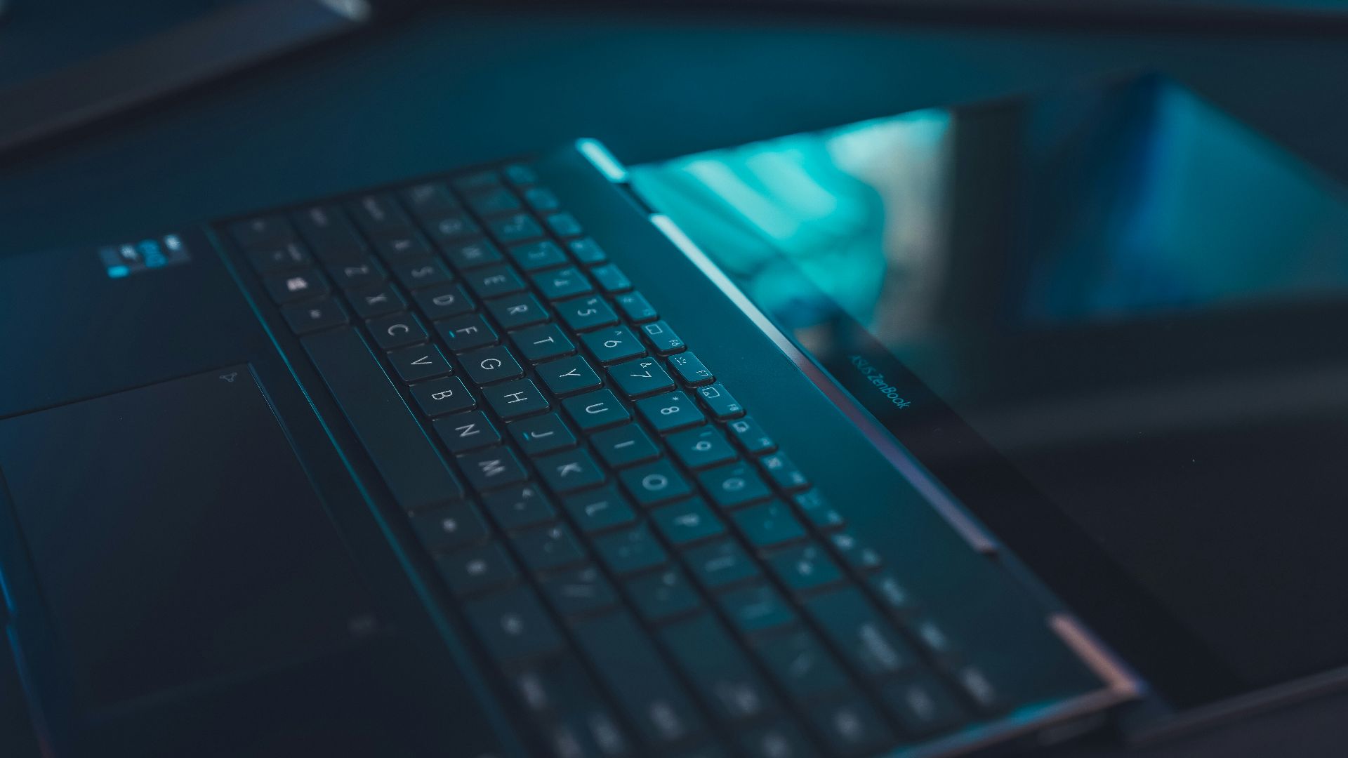 black and blue laptop computer