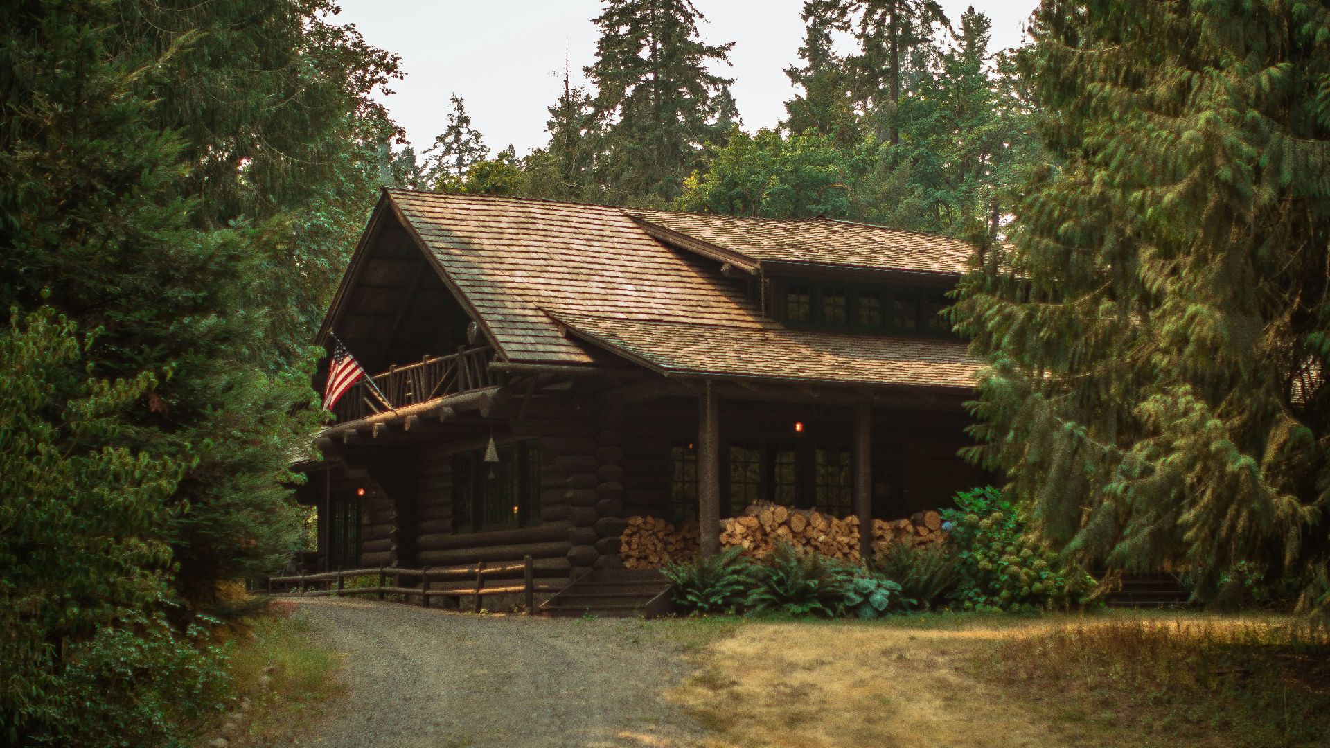 pathway towards brown wooden house during daytime