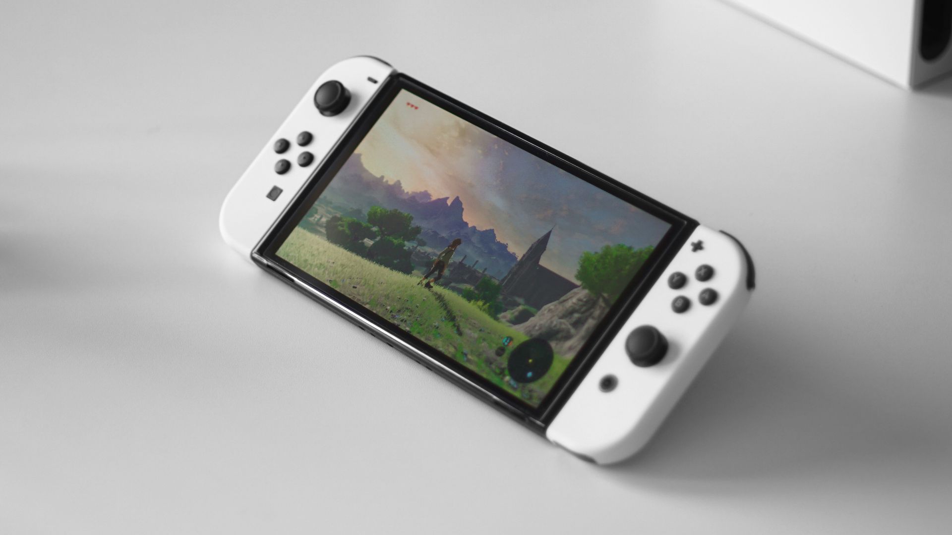 a nintendo wii game controller sitting on top of a table