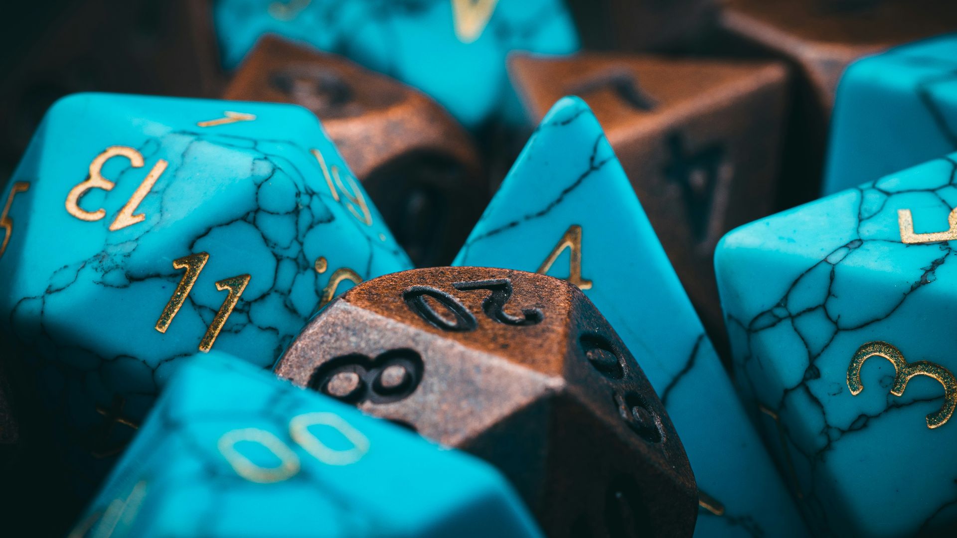a group of blue and brown dice sitting on top of each other