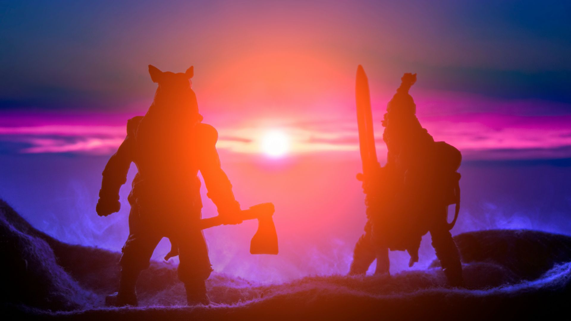 a group of people with their hands in the air with a fire in the background