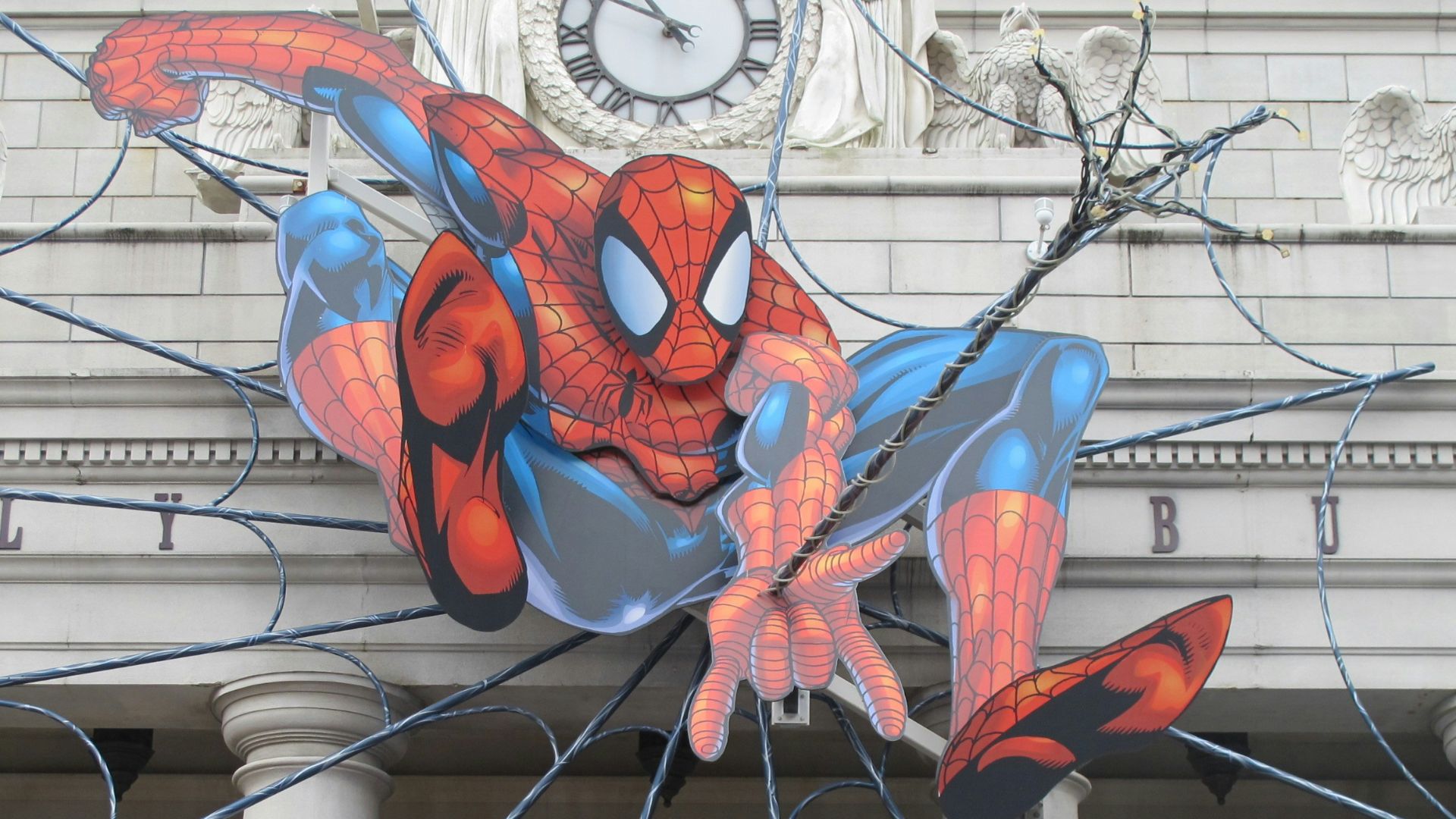 a sign for the amazing adventures of spider - man