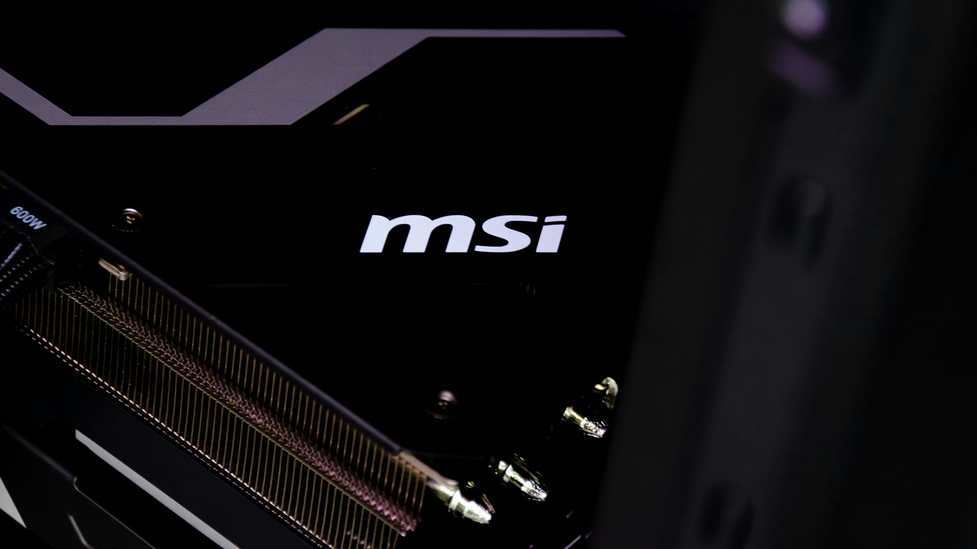 A close up of the msi logo on the side of a motherboard