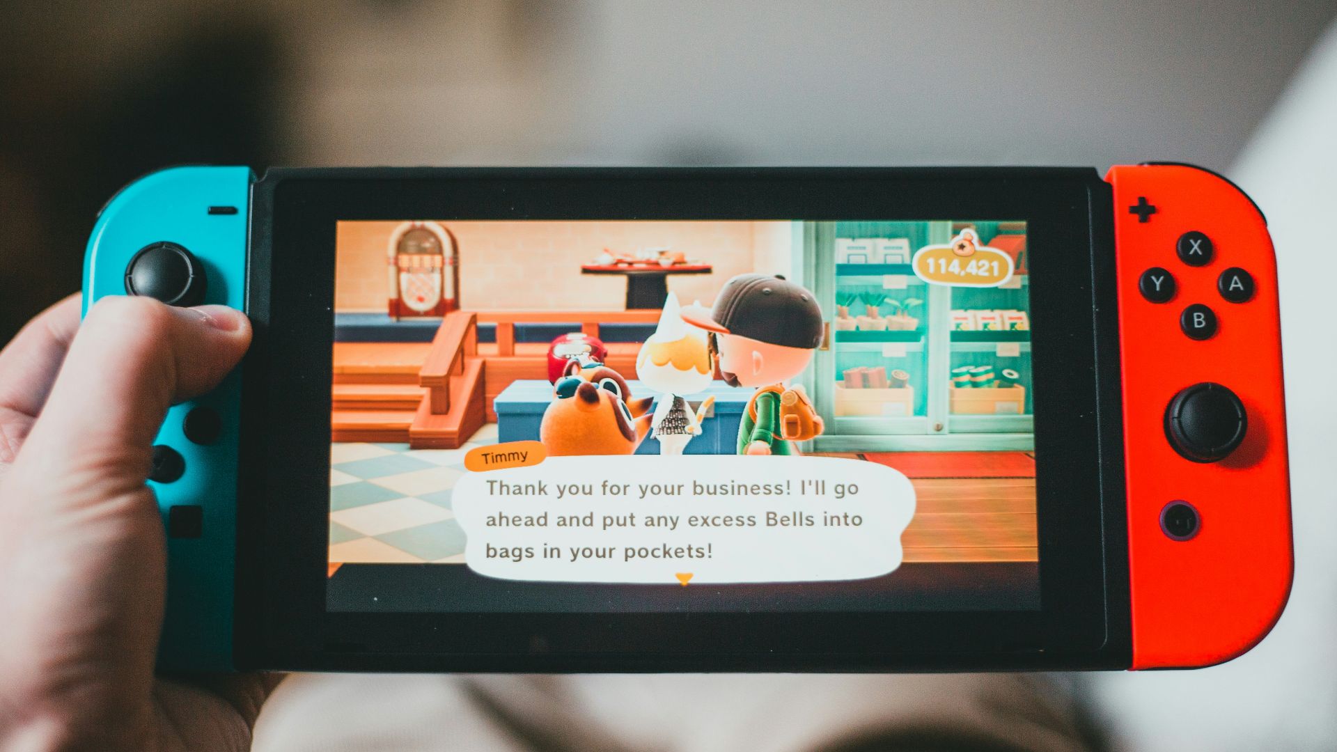 black android smartphone displaying man in white shirt