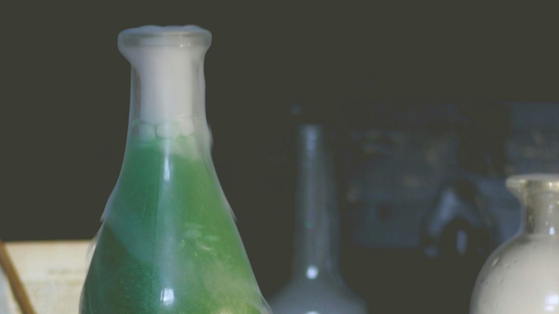 a table topped with different types of glassware