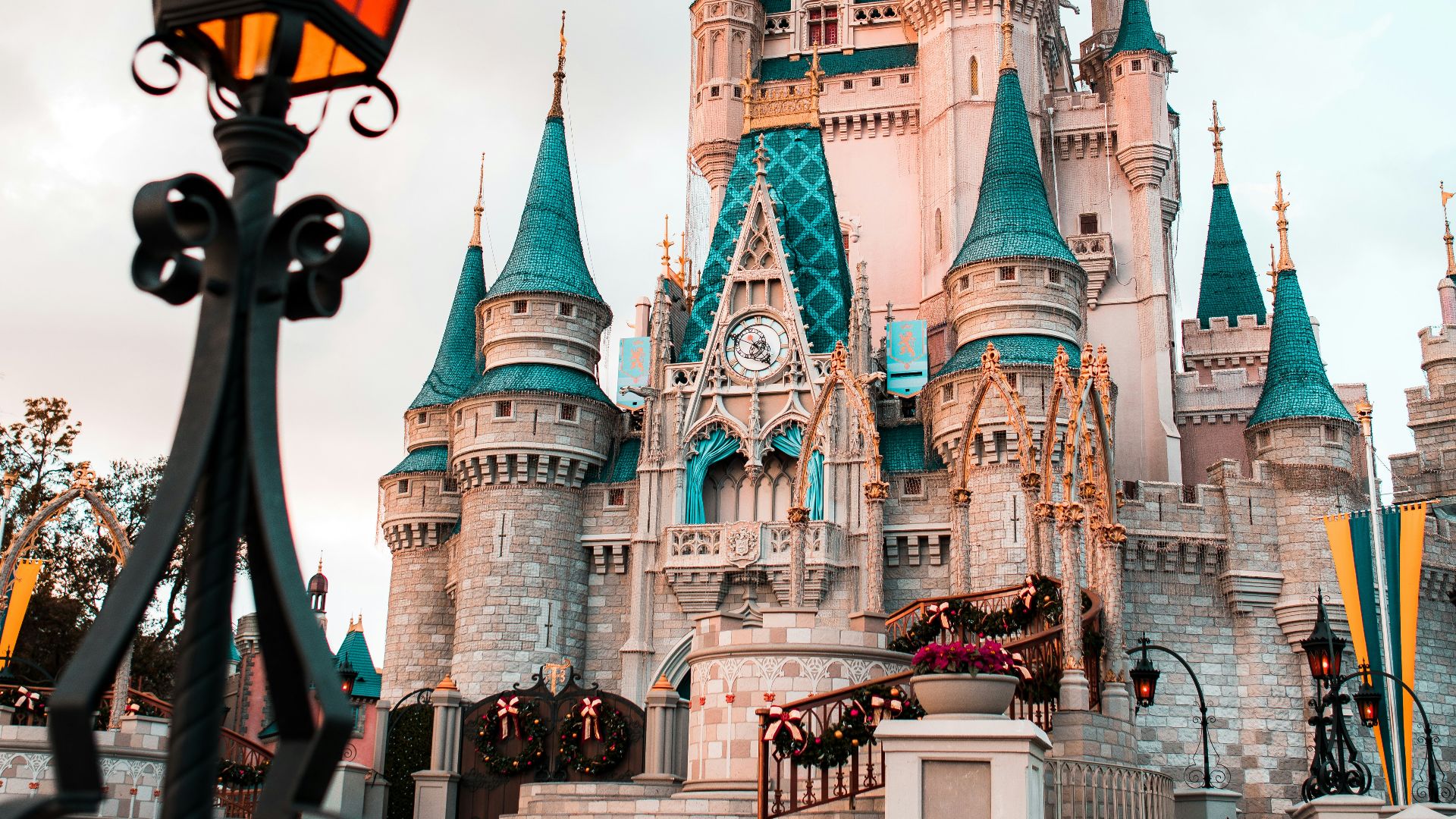 white and blue castle under cloudy sky during daytime