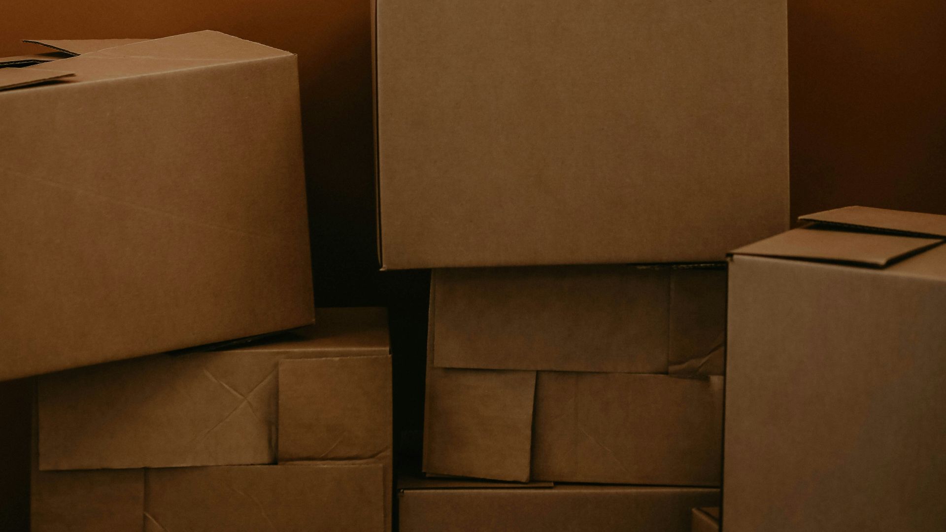 white cardboard box on brown wooden table