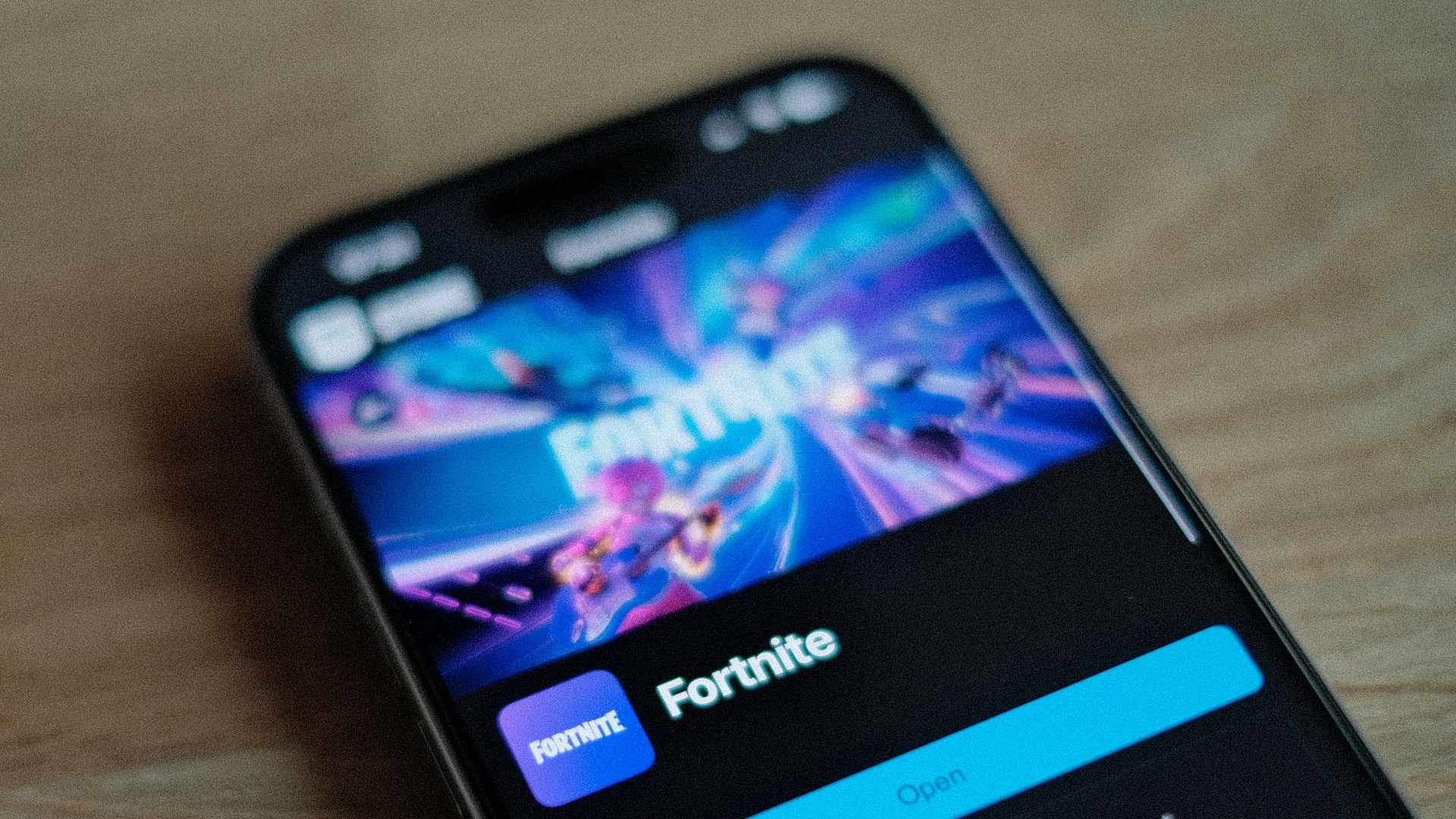 A close up of a cell phone on a table