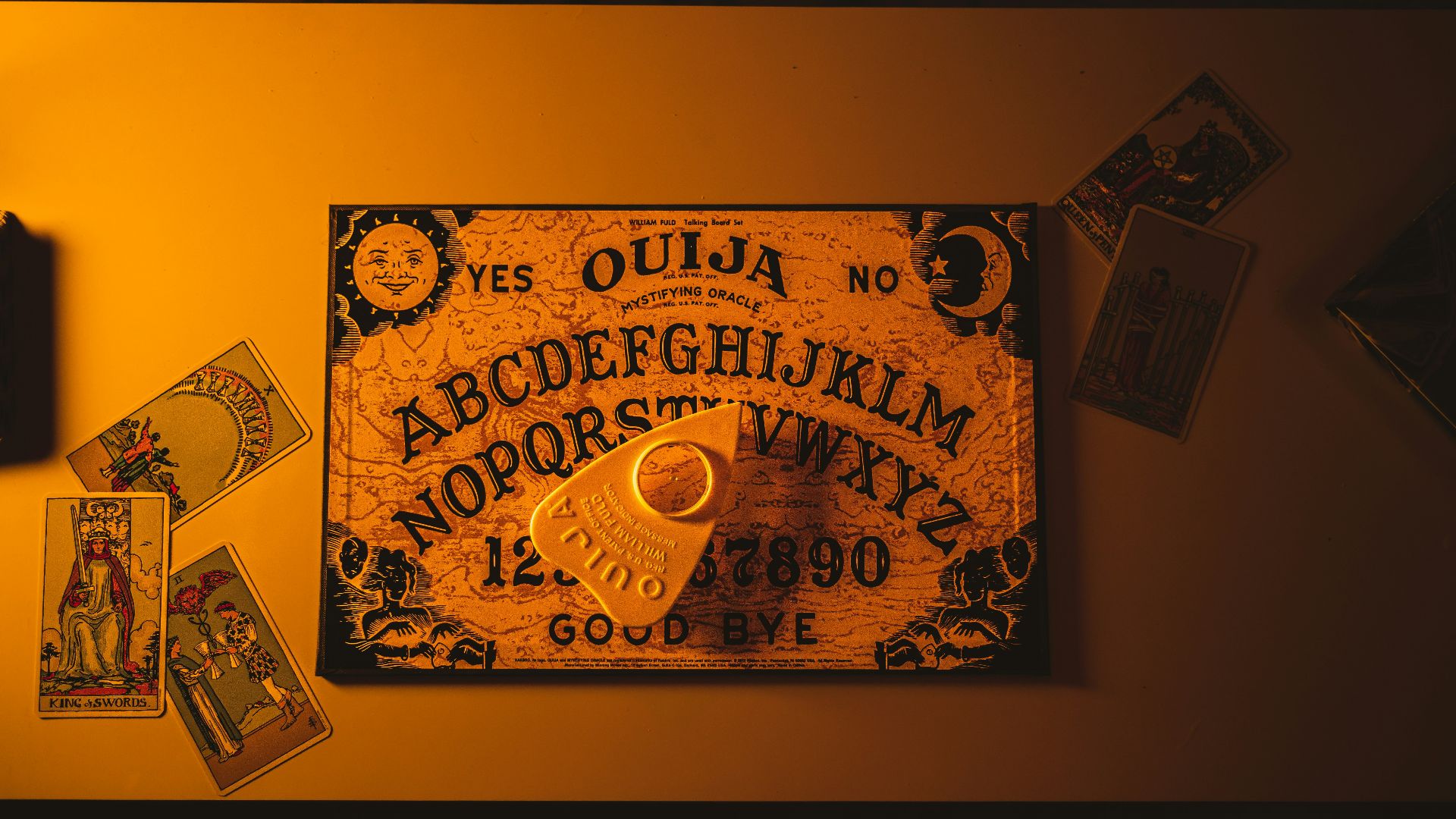 a picture of a key and some cards on a table