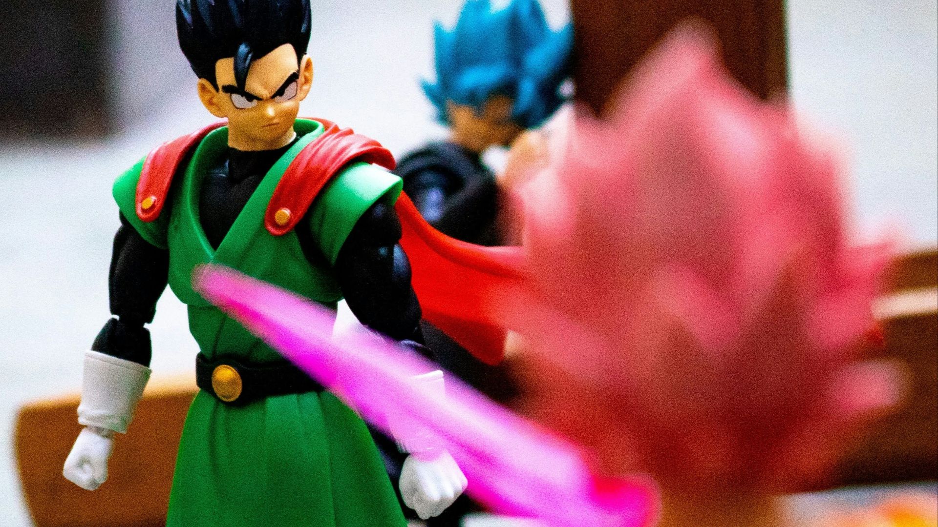 two action figures on a tiled floor