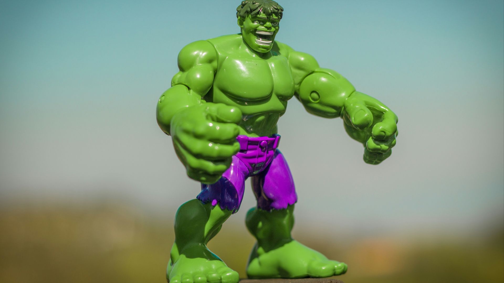 Marvel Hulk action figure standing on gray surface