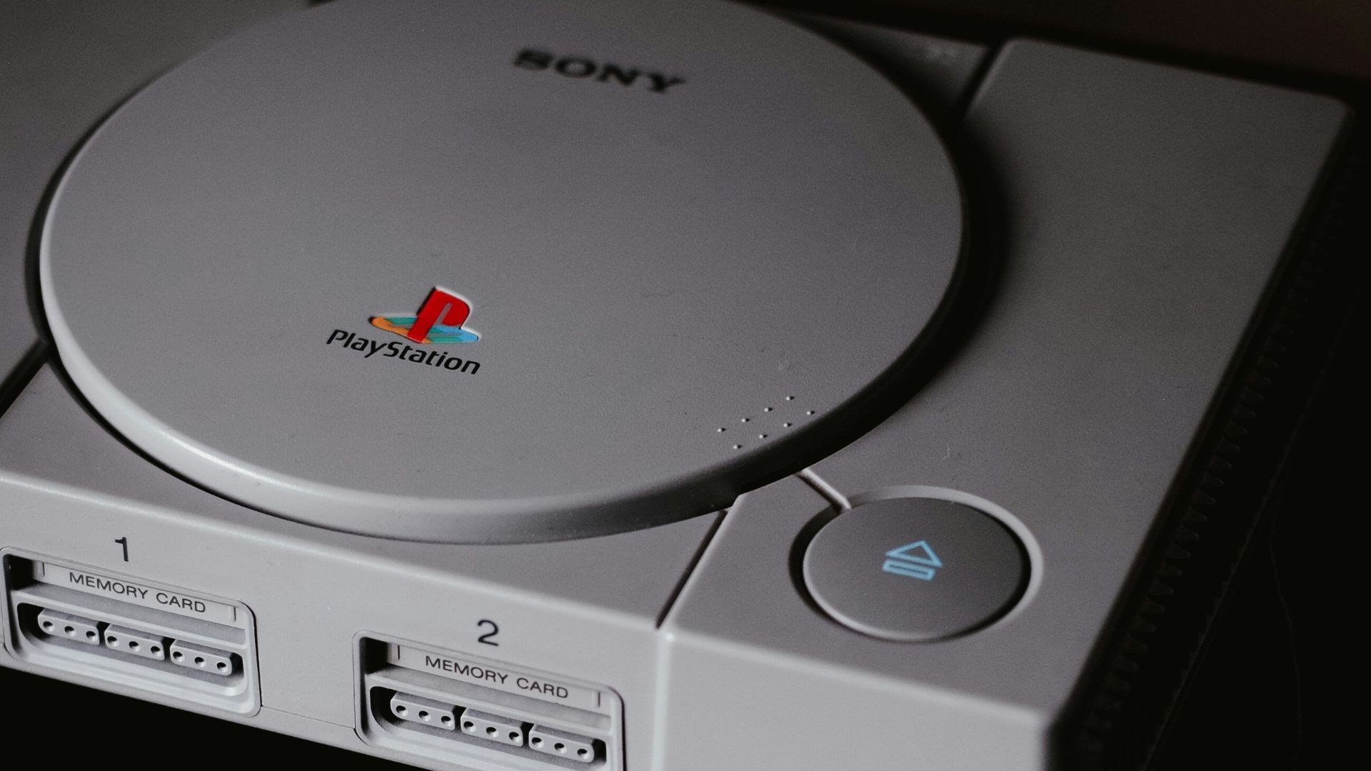 photo of closed Sony PS1 with DualShock 1