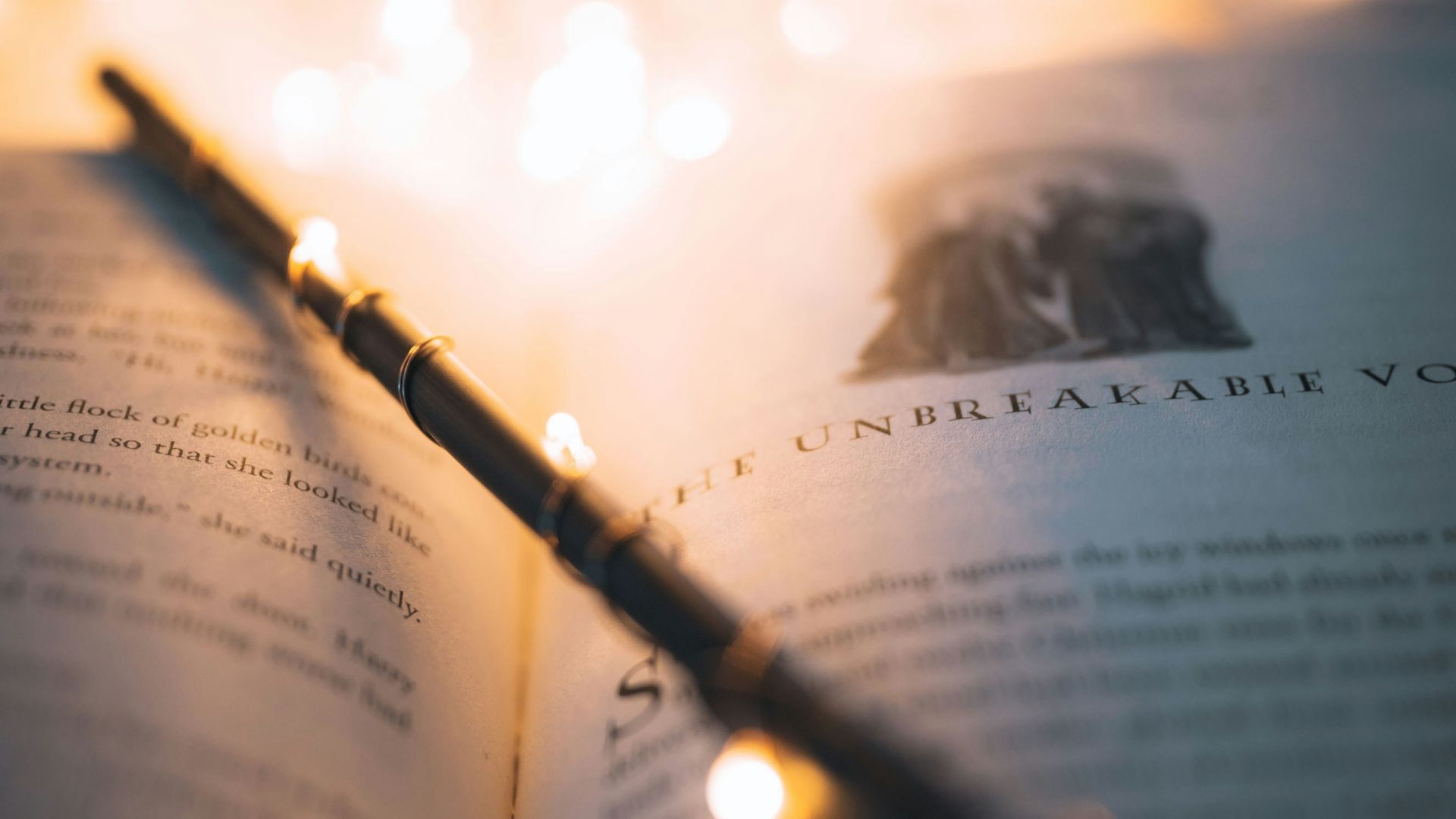 gold flute on white book page