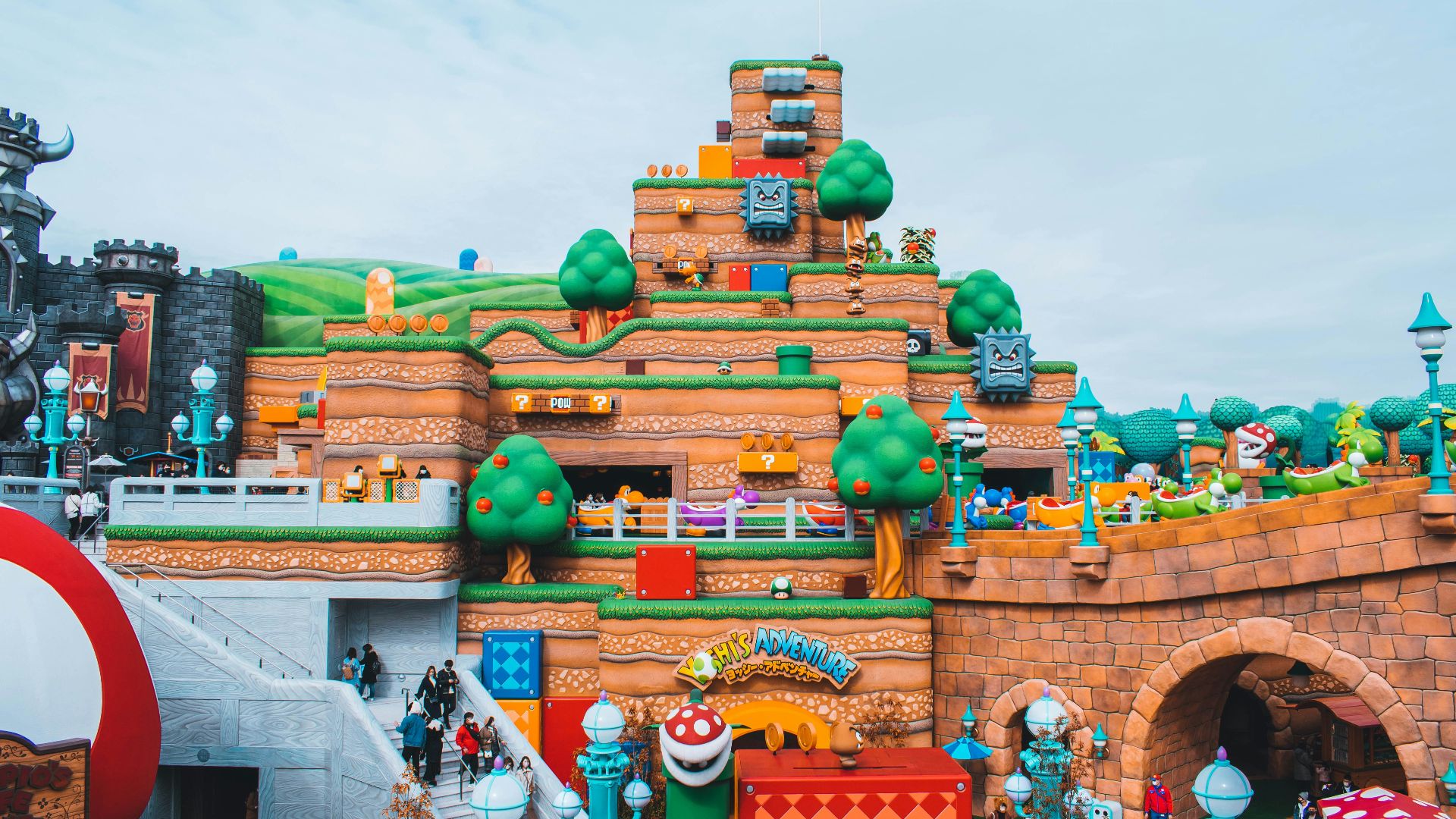 people walking near brown concrete building during daytime