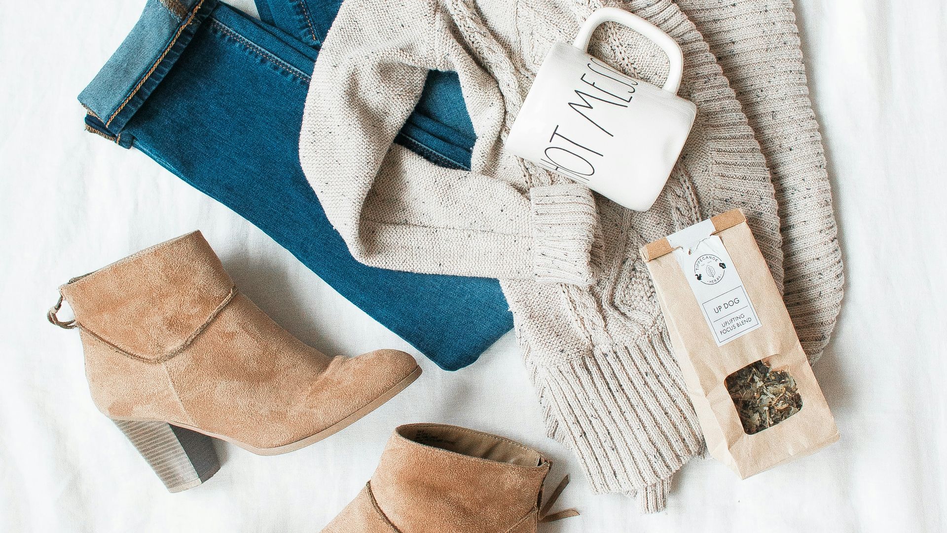 gray cardigan, blue jeans, and pair of brown chunky heeled shoes