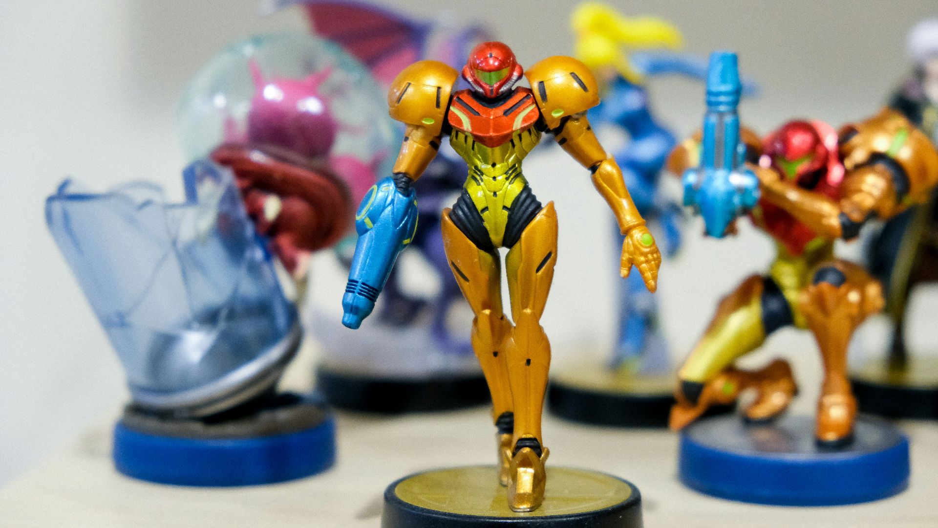 man wearing yellow and red costume character scale model