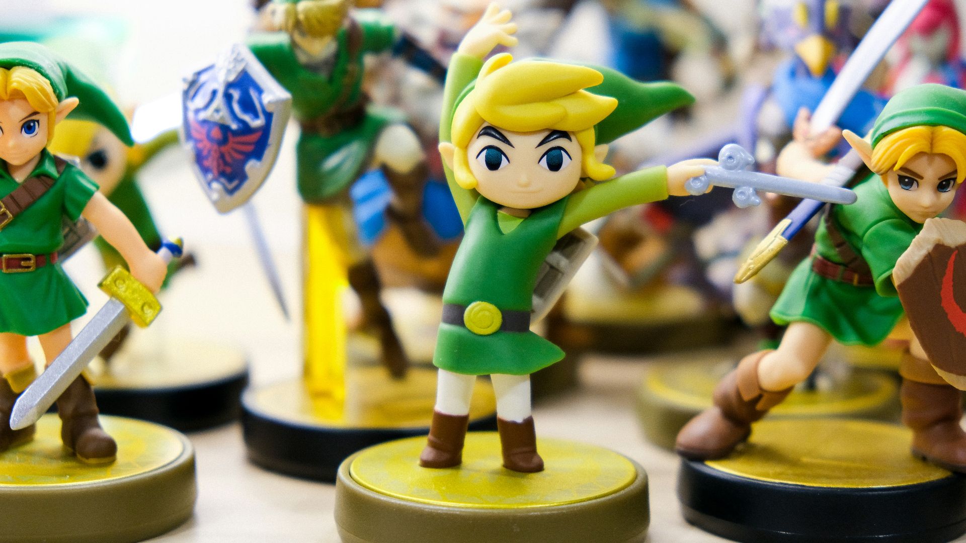 selective focus photography of Link vinyl figures