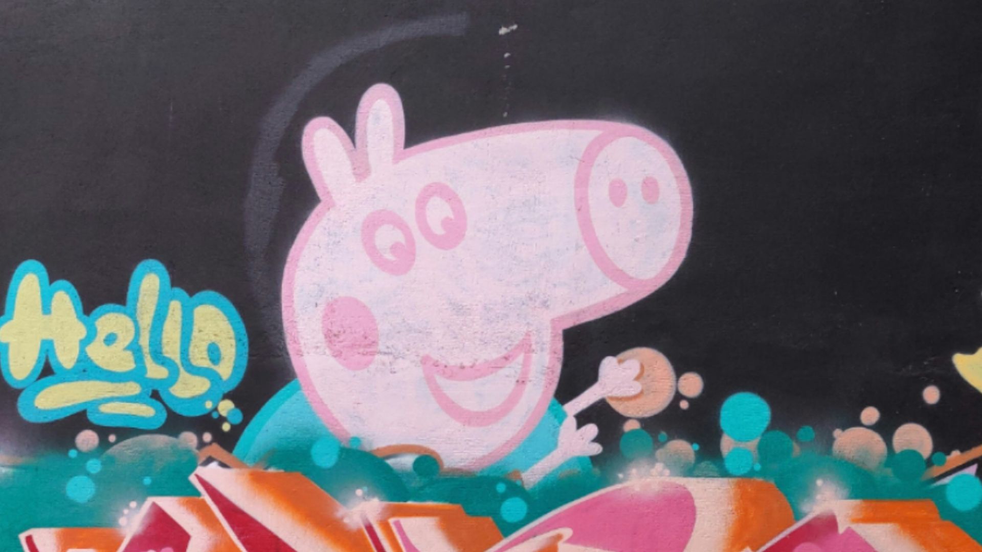 green and pink graffiti art