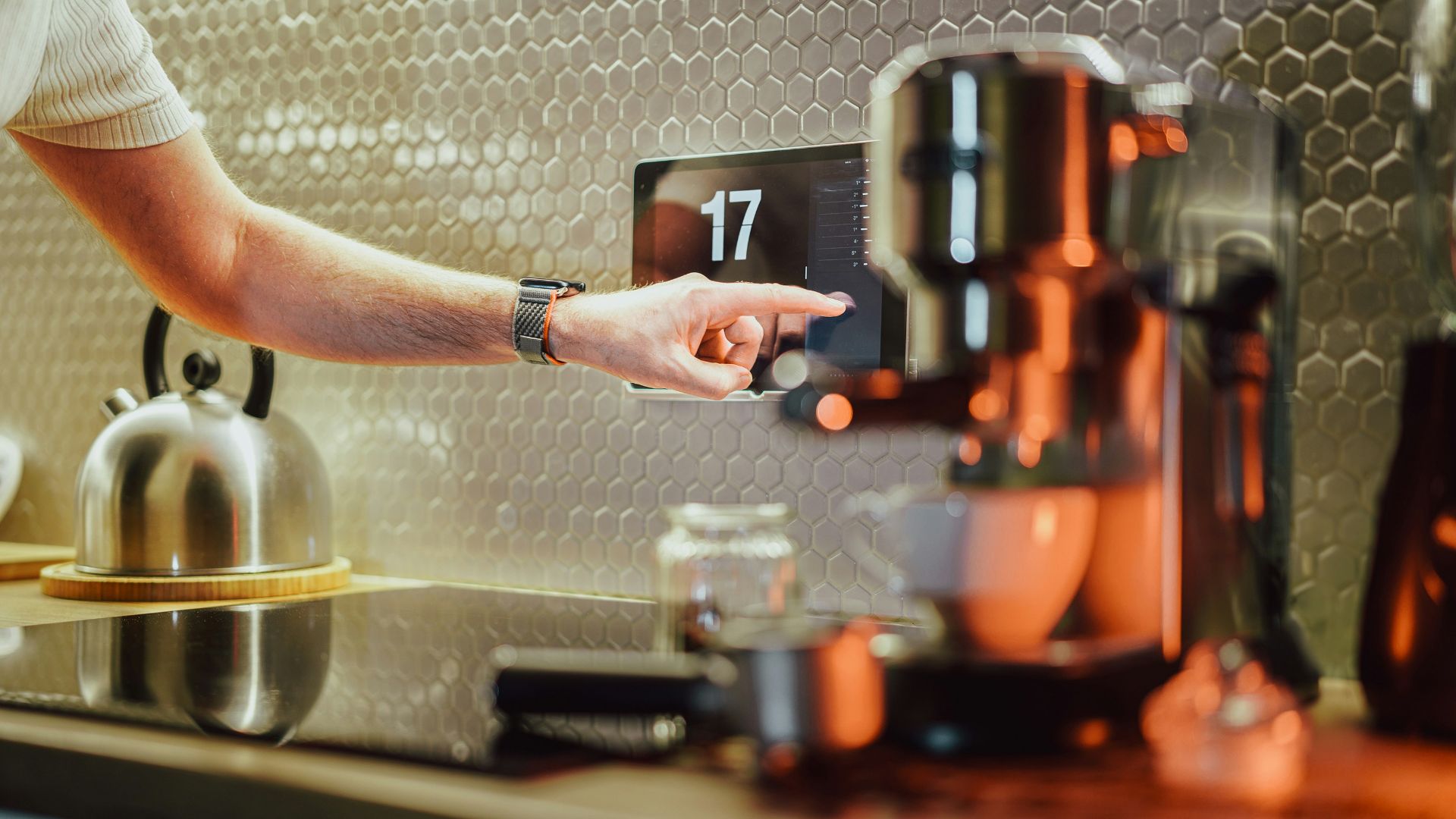 a person pressing a button on a coffee machine