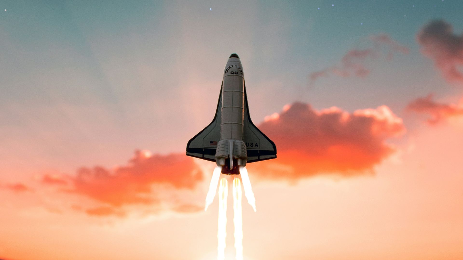 white and black plane flying in the sky during daytime
