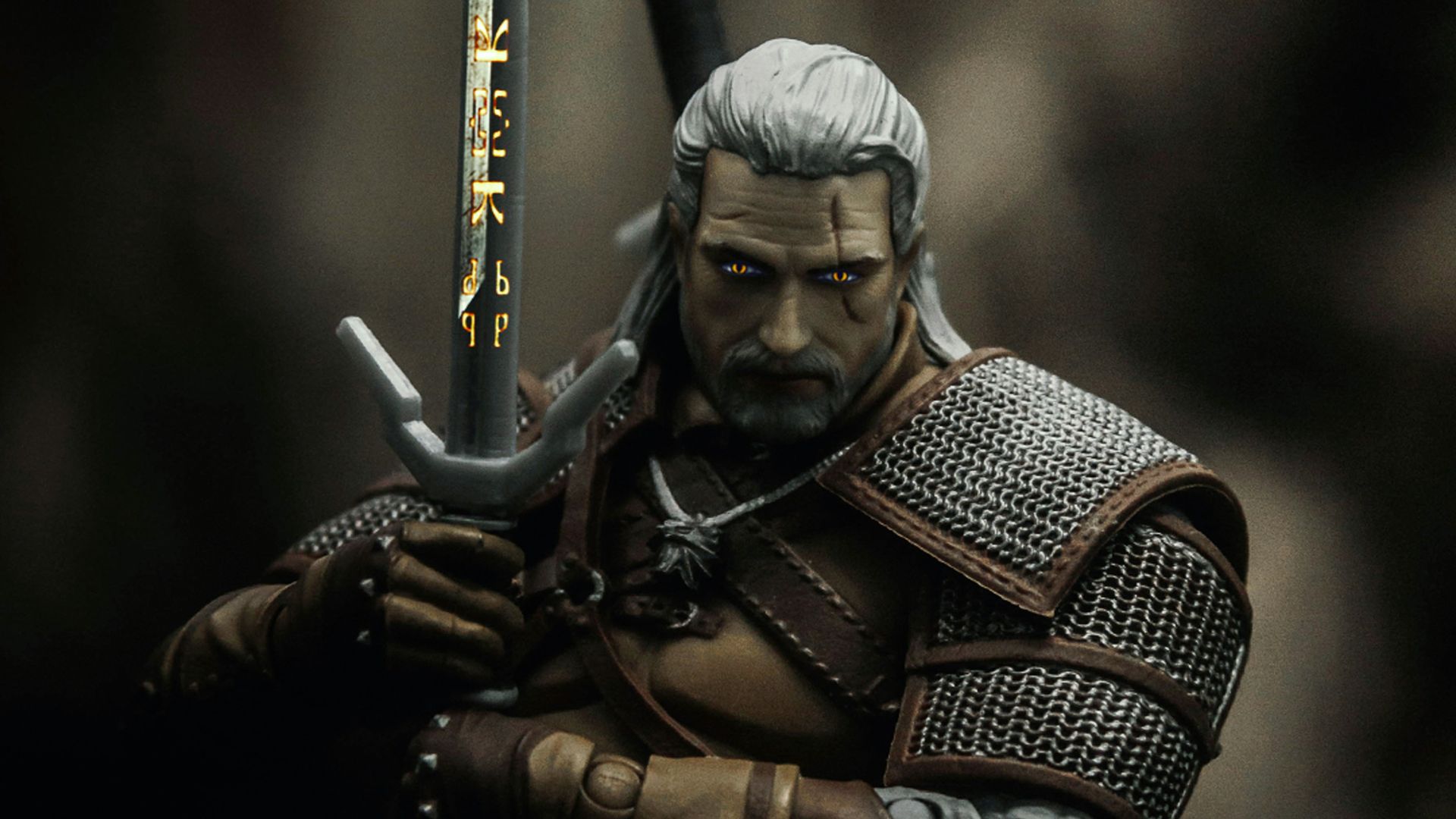 man in black and brown suit holding sword