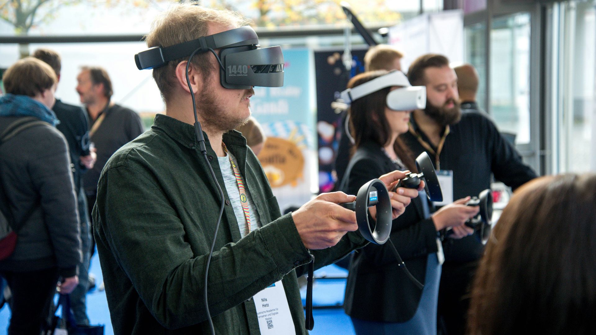 person wearing VR smartphone headset inside room